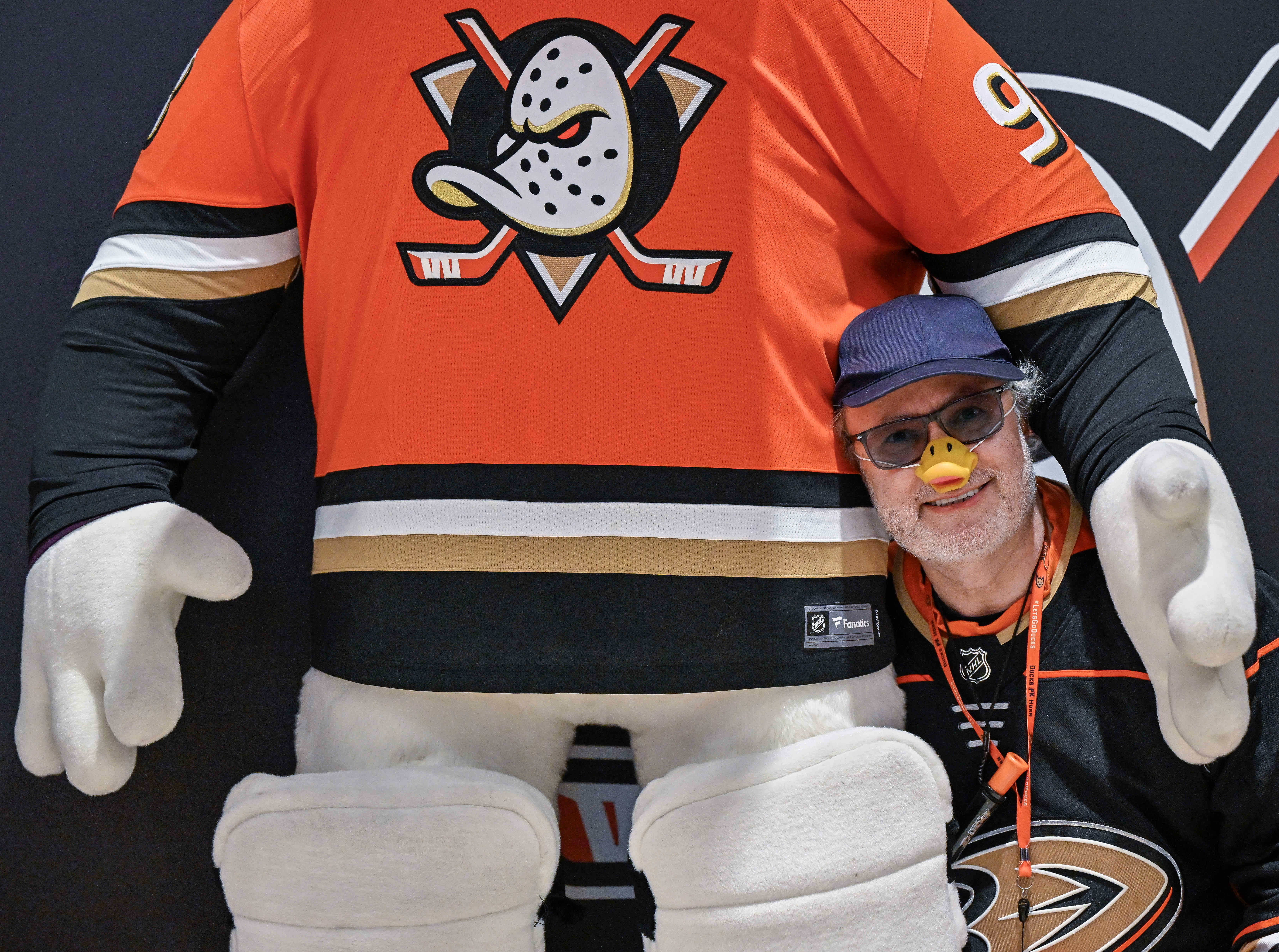 Michael Rakijas of Yorba Linda, wearing a Ducks jersey and...