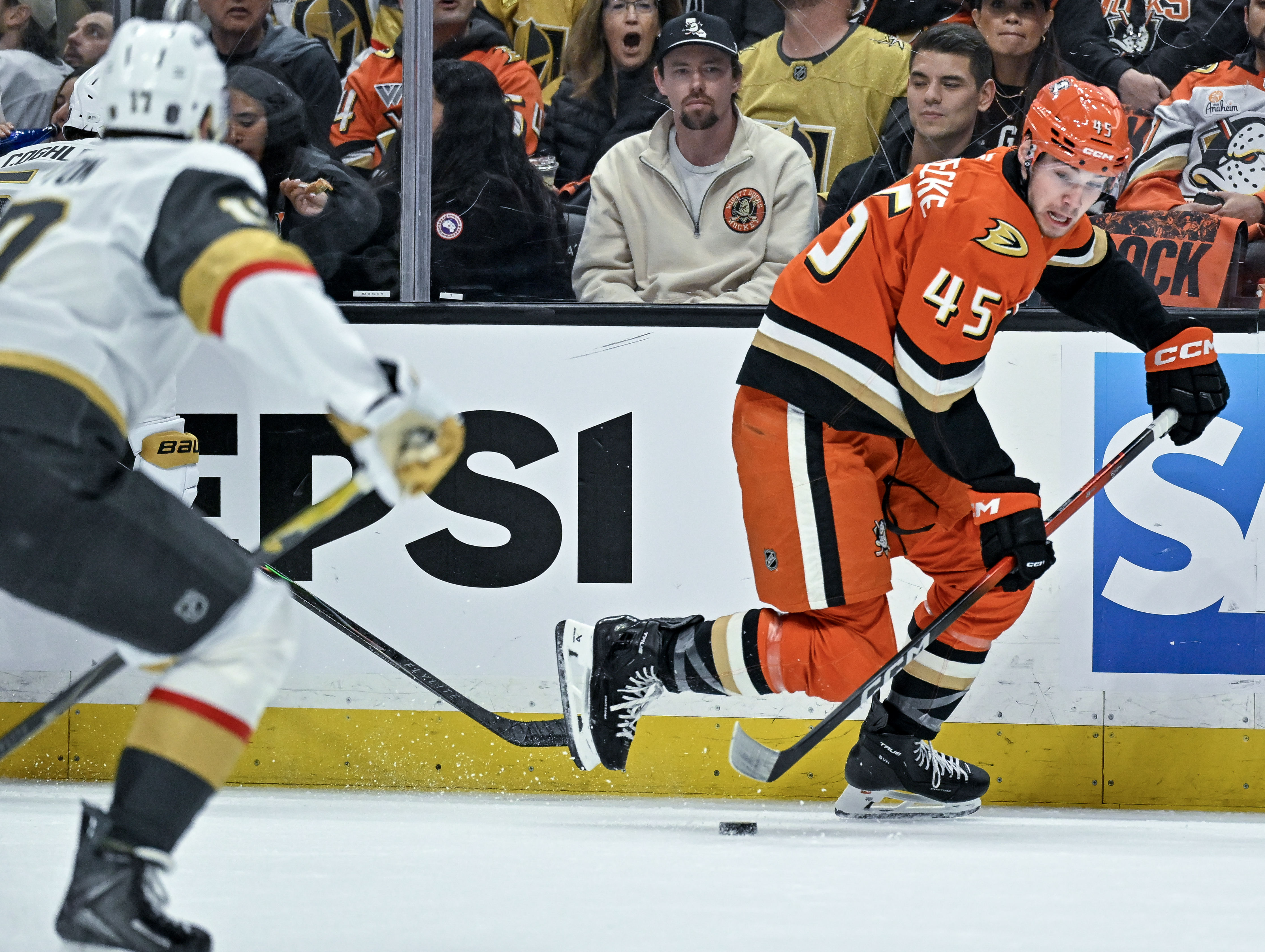 The Ducksâ Beckett Sennecke controls the puck during the first...