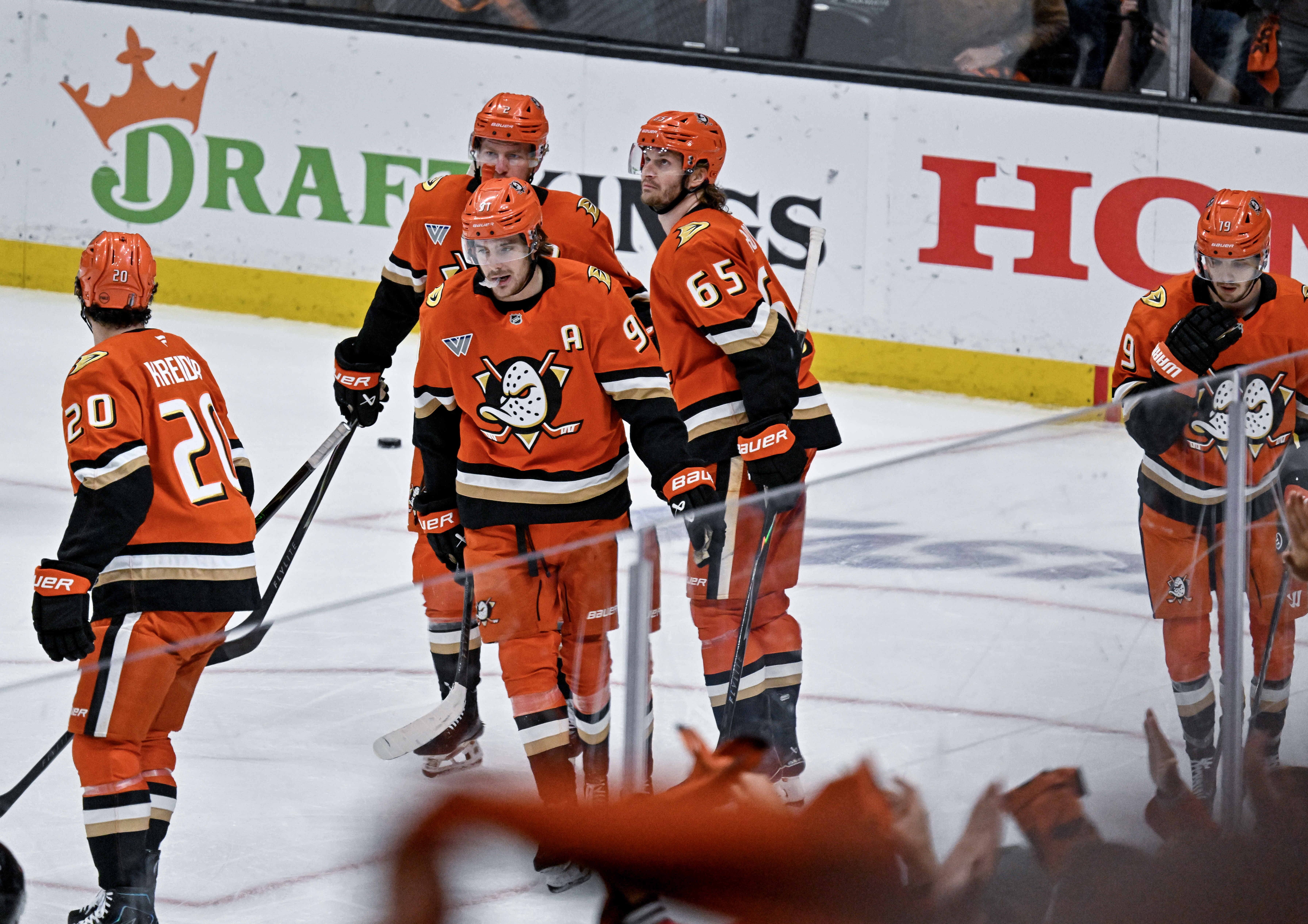 The Ducks celebrate a third period goal by Chris Kreider...