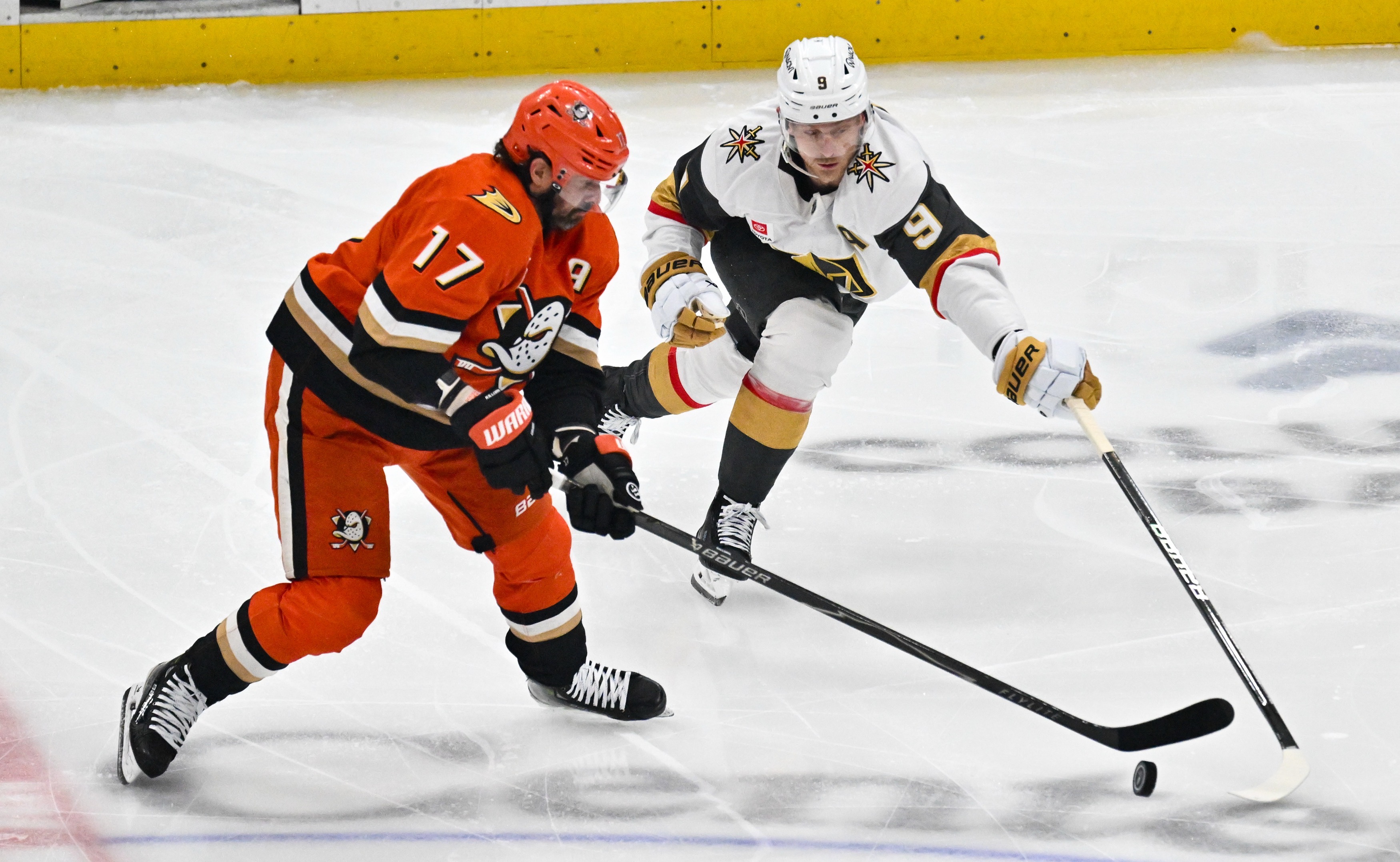The Ducks’ Alex Killorn, left, and the Vegas Golden Knights’...