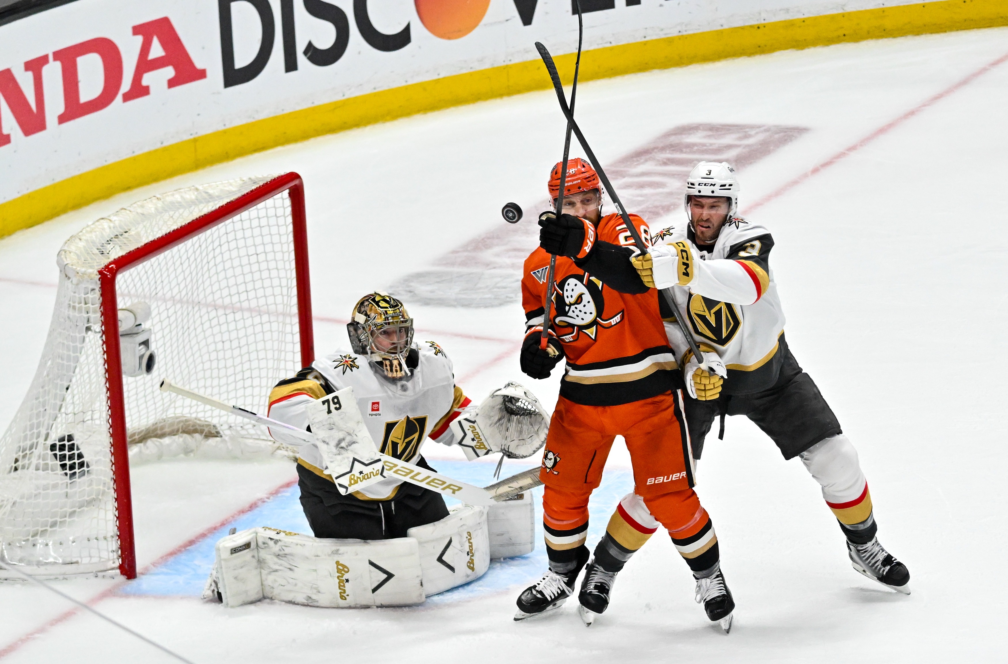 The Ducks Jeffrey Viel (28) and Vegas Golden Knights Brayden...