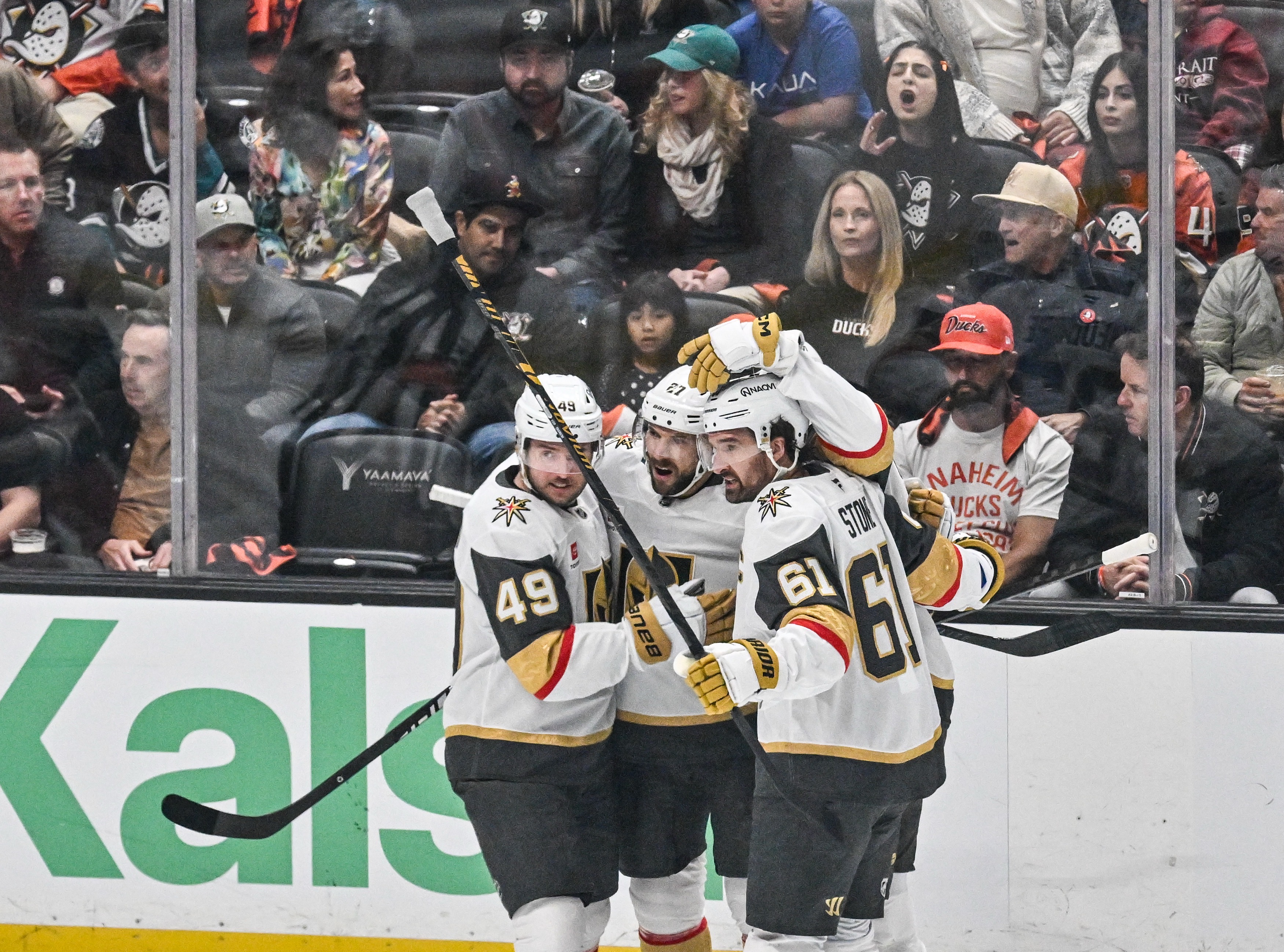 Vegas Golden Knights players Ivan Barbashev, left, Shea Theodore, center,...
