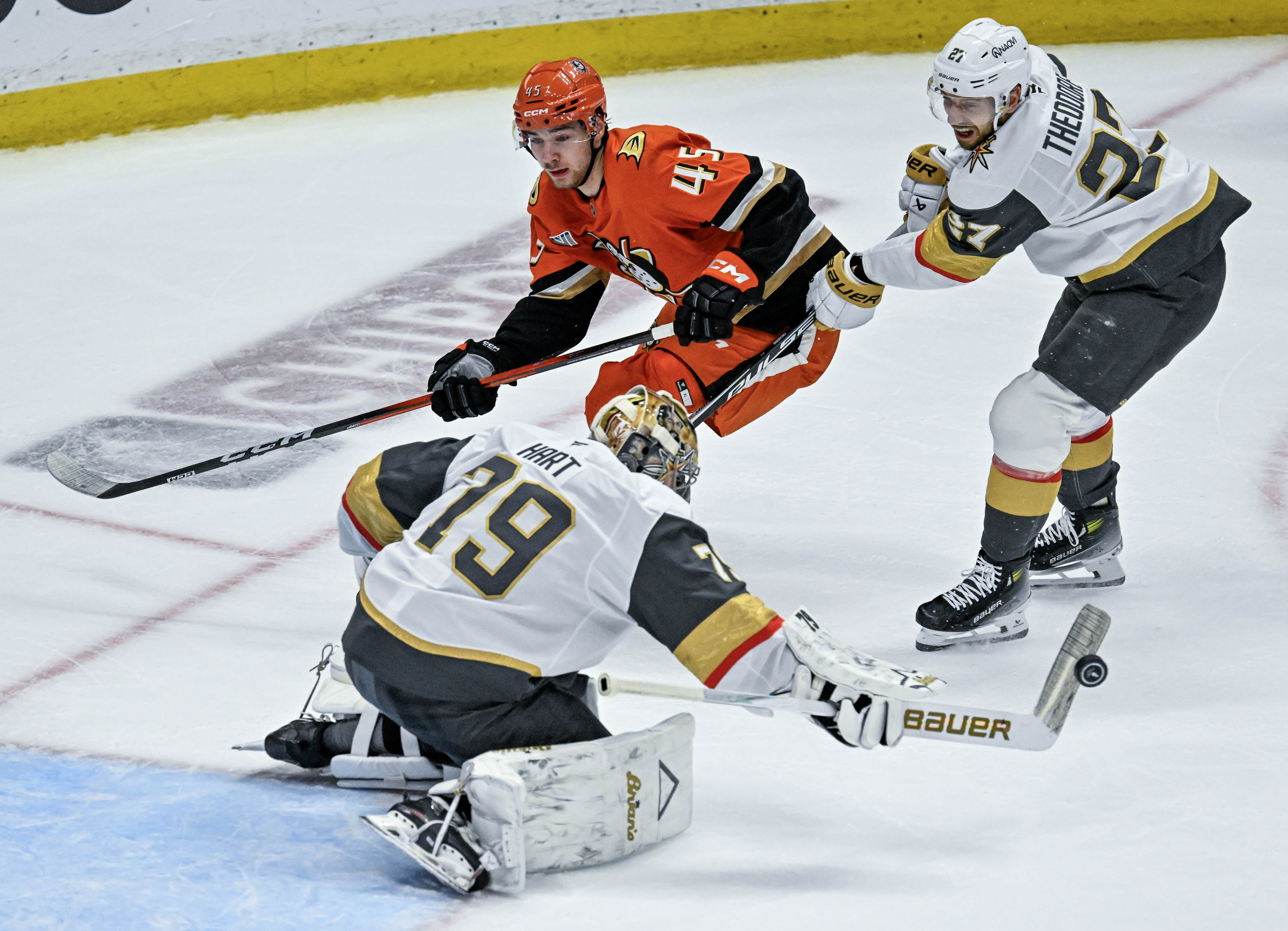 The Golden Knights goalie Carter Hart (79) blocks a shot...