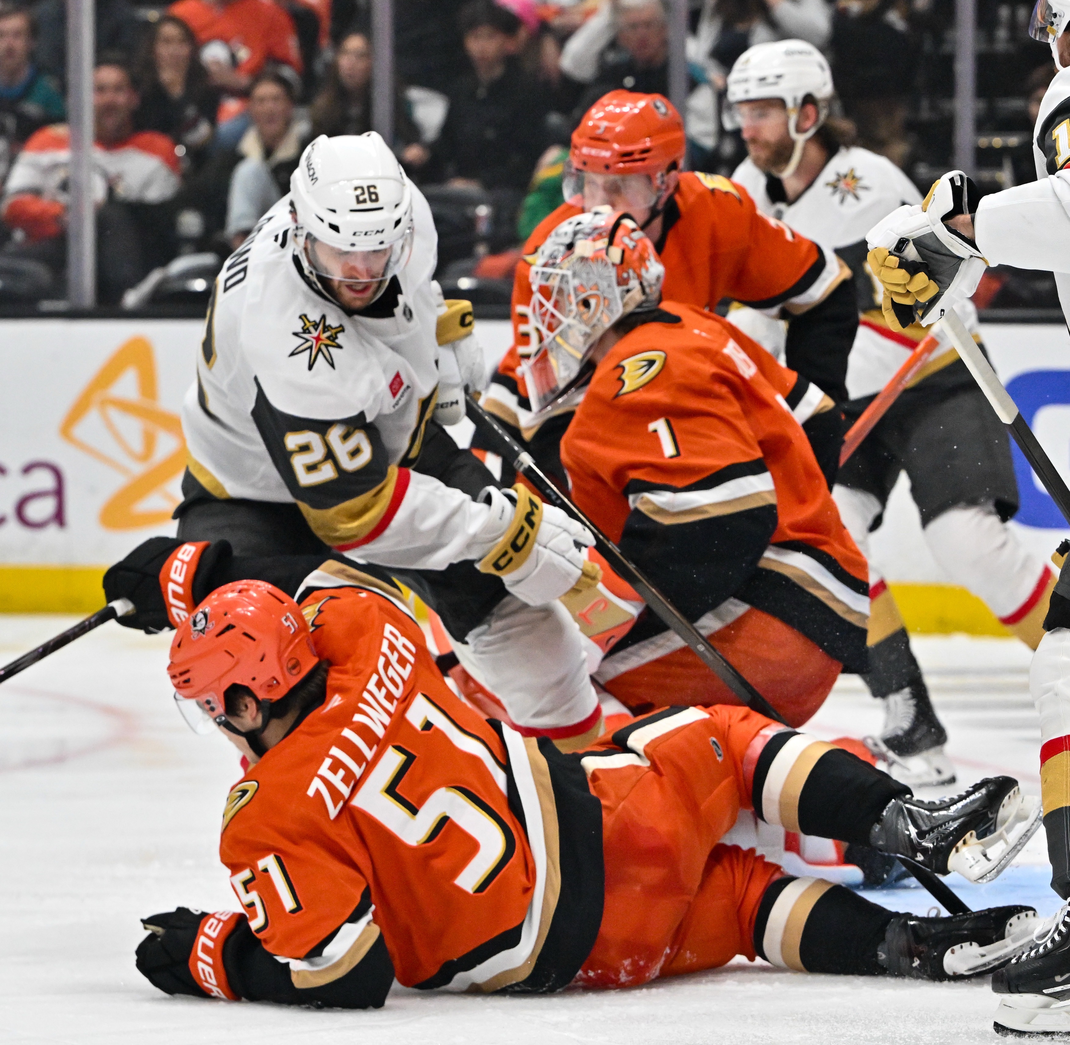 The Ducks Olen Zellweger (51) and Lukas Dostal (1) collide...