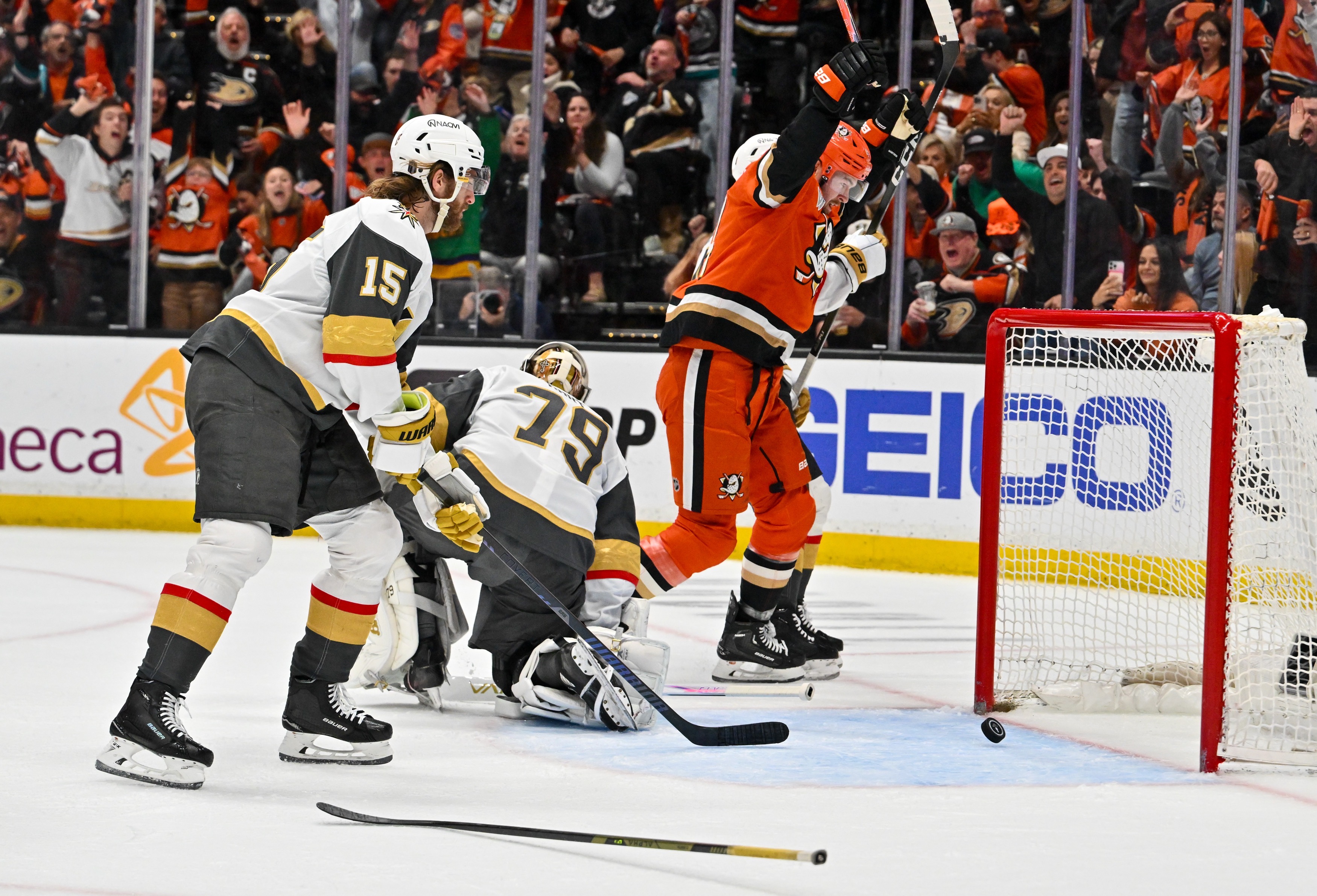 The Ducksâ Ross Johnston (44) reacts after scoring against the...