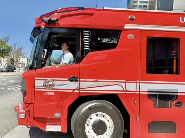 The Los Angeles Fire Department shows off the first all-electric fire engine in North America during Fire Service Day, Saturday, May 14, 2022, at Fire Station 82 in Hollywood. The new electric truck was custom-made for the department. Above, Fire Chief Kristin M. Crowley drove the new engine from the LAFD Museum to Station 82. (Photo by Rick McClure/Contributing Photographer)
