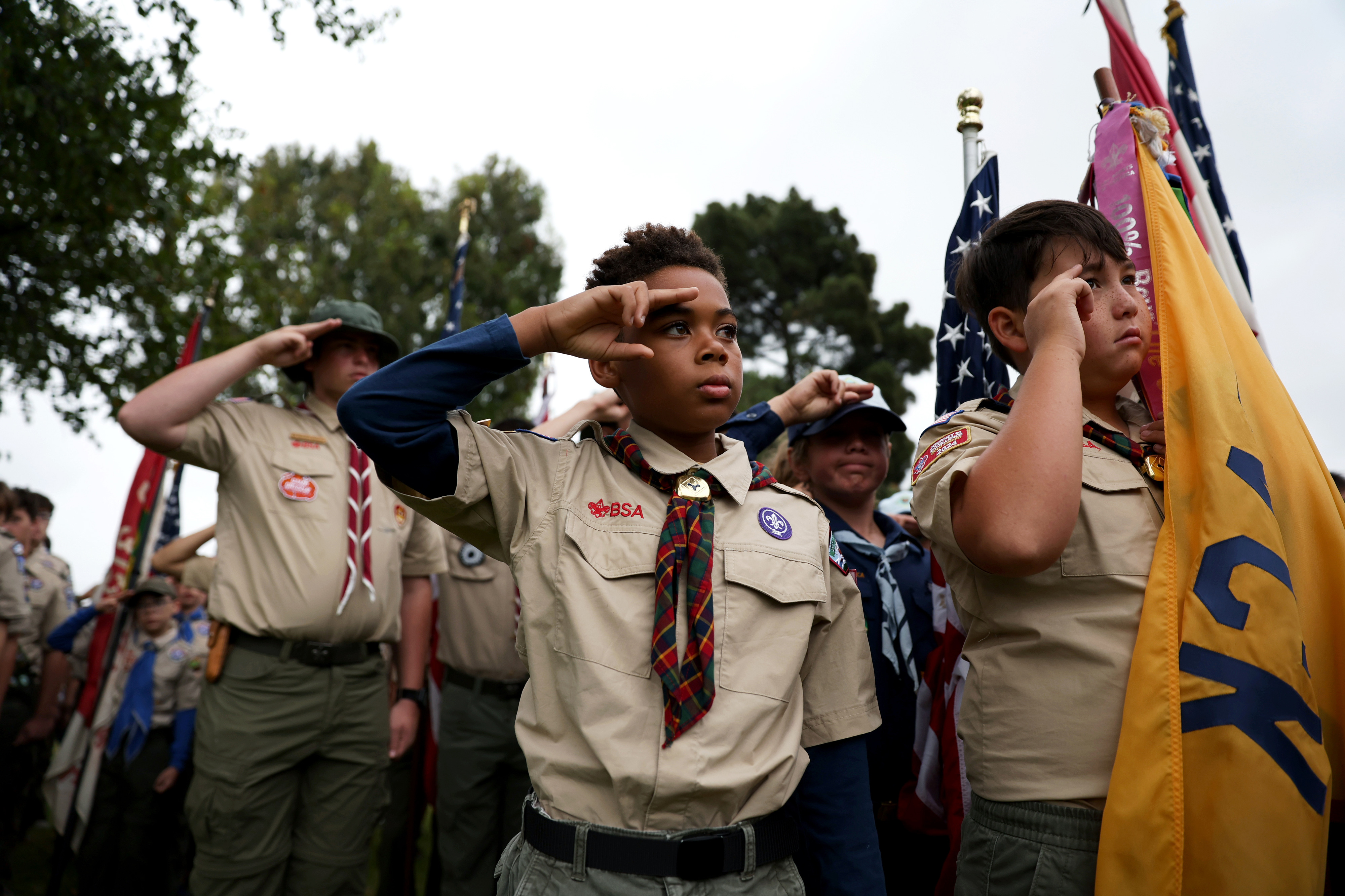 Theo Shen, 12, center, and Barron Kwan, 11, right, of...