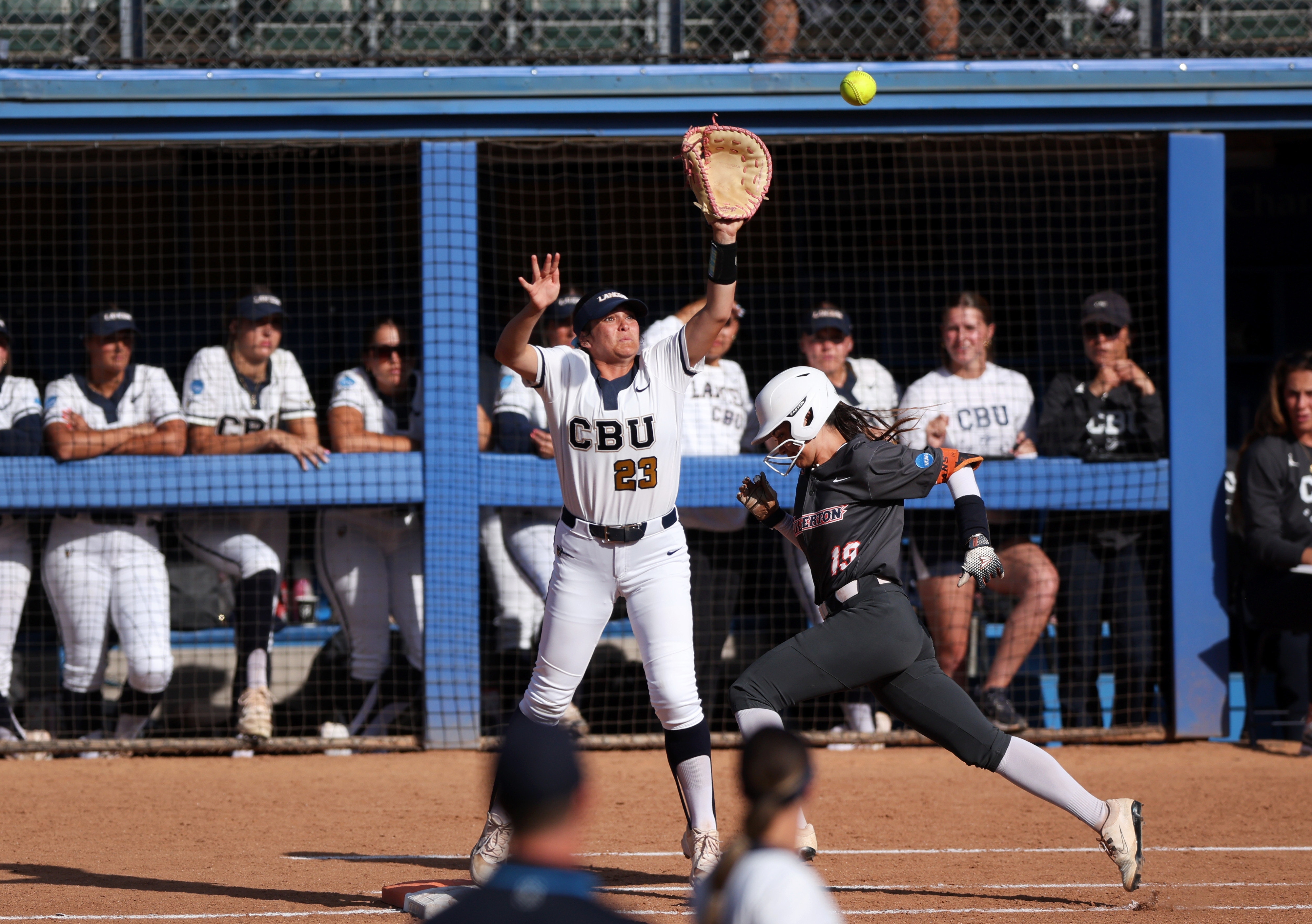 Cal State Fullertonâs Colby McClinton (19) races for first base...