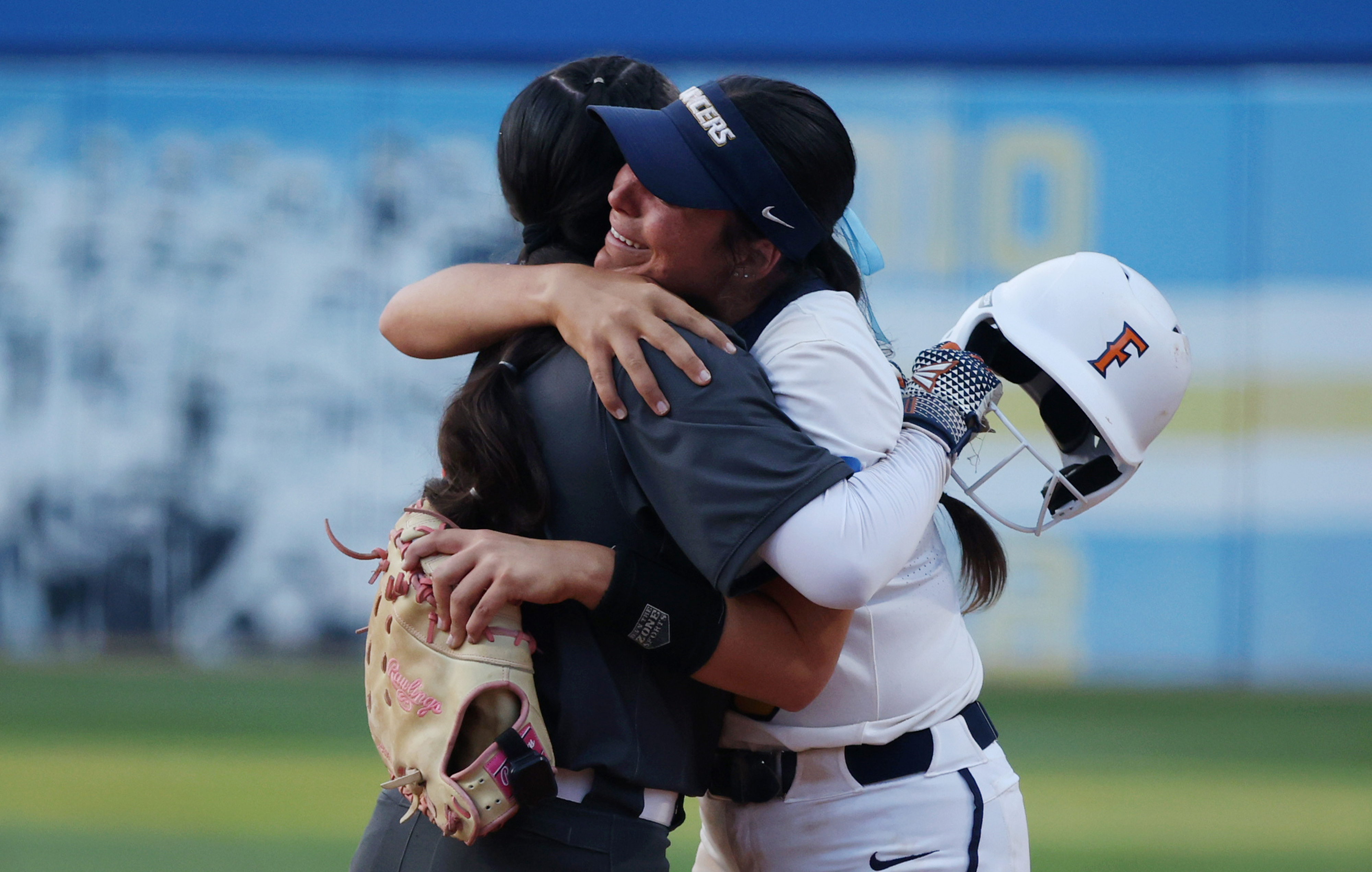 California Baptistâs Ashlee Annett, right, is embraced by Cal State...