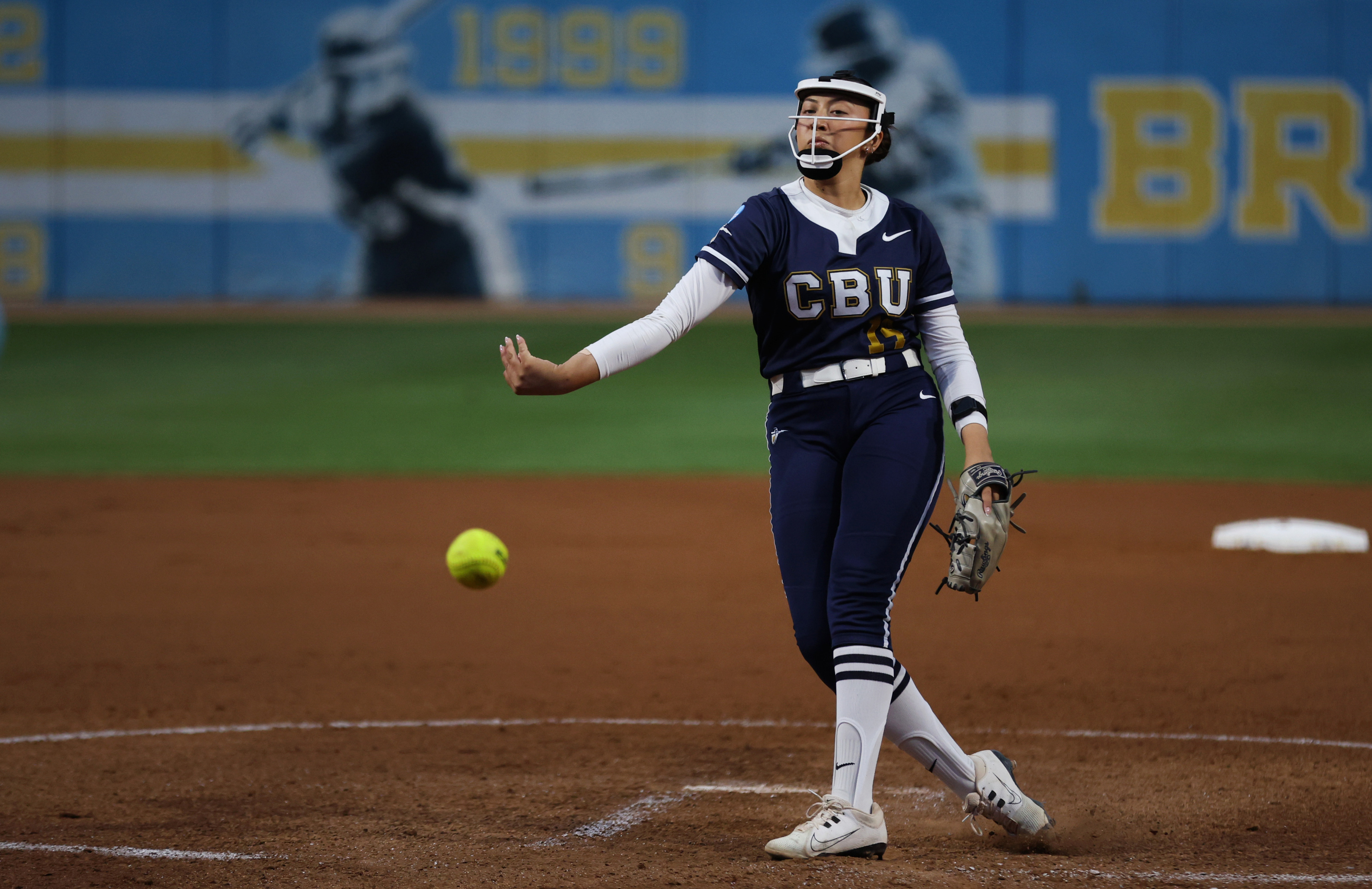 California Baptist pitcher Miranda De Nava throws to the plate...