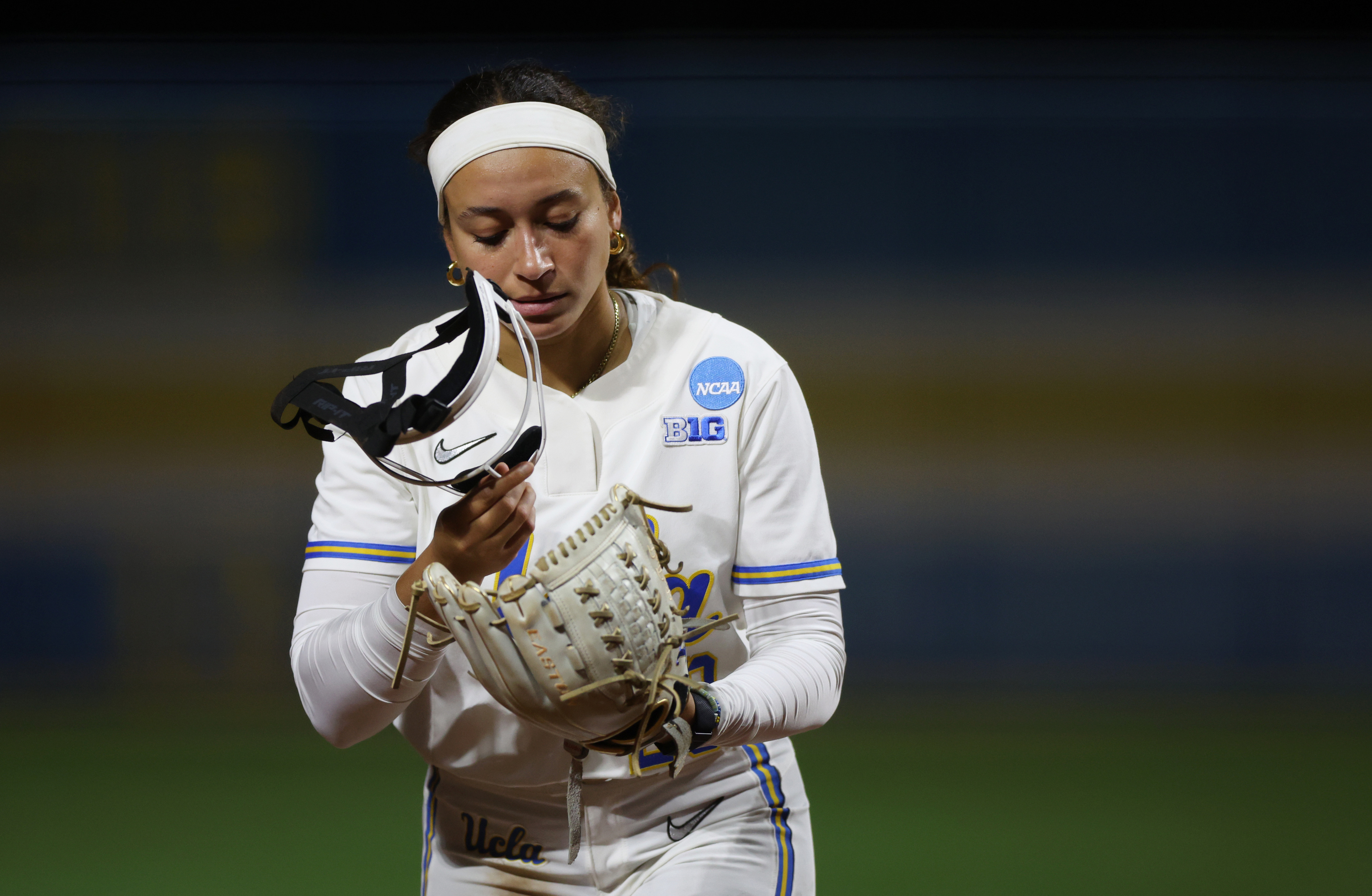 UCLA starting pitcher Taylor Tinsley walks off the field after...