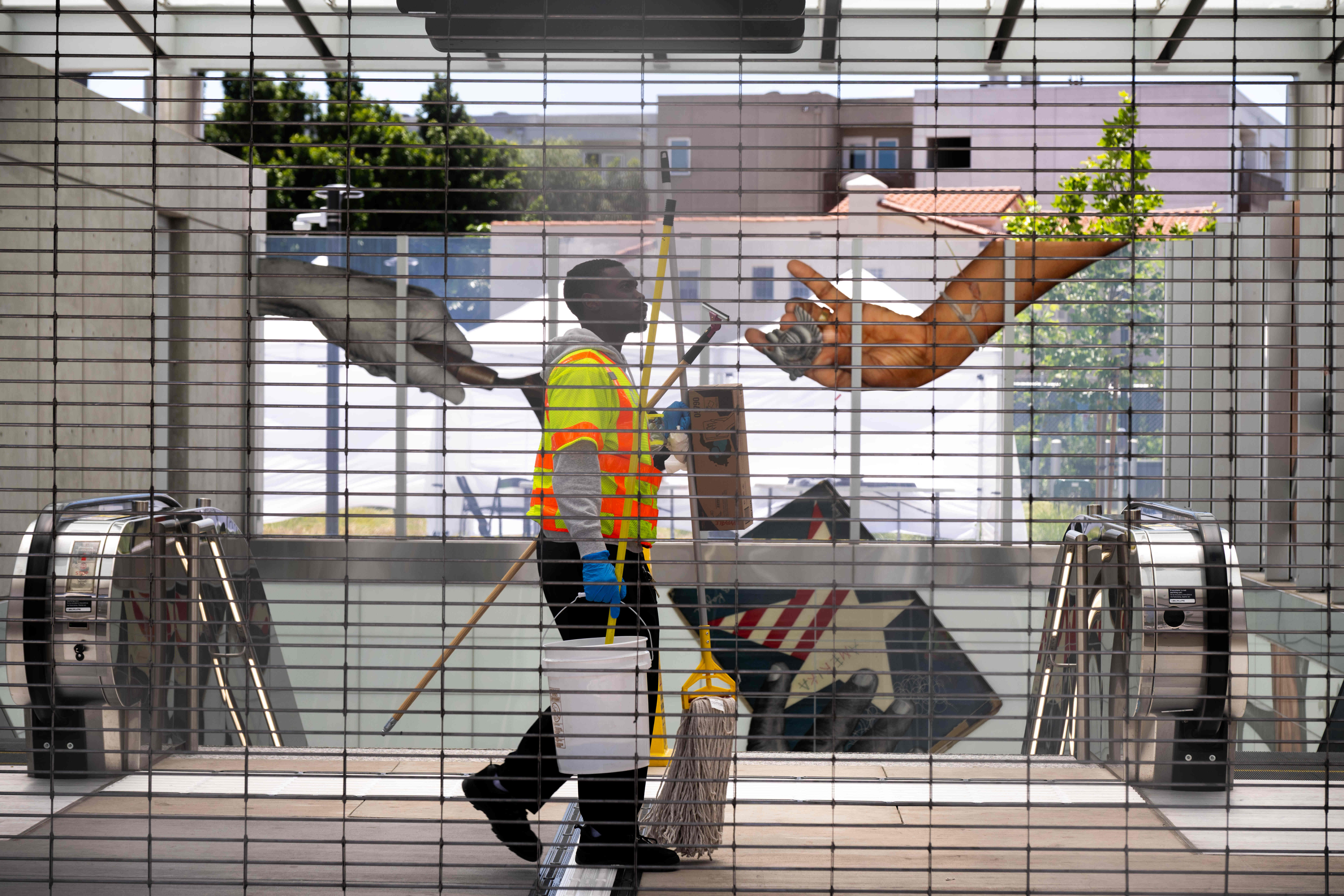 A janitor cleans the Metro D Line Subway Extensionâs Wilshire/Fairfax...