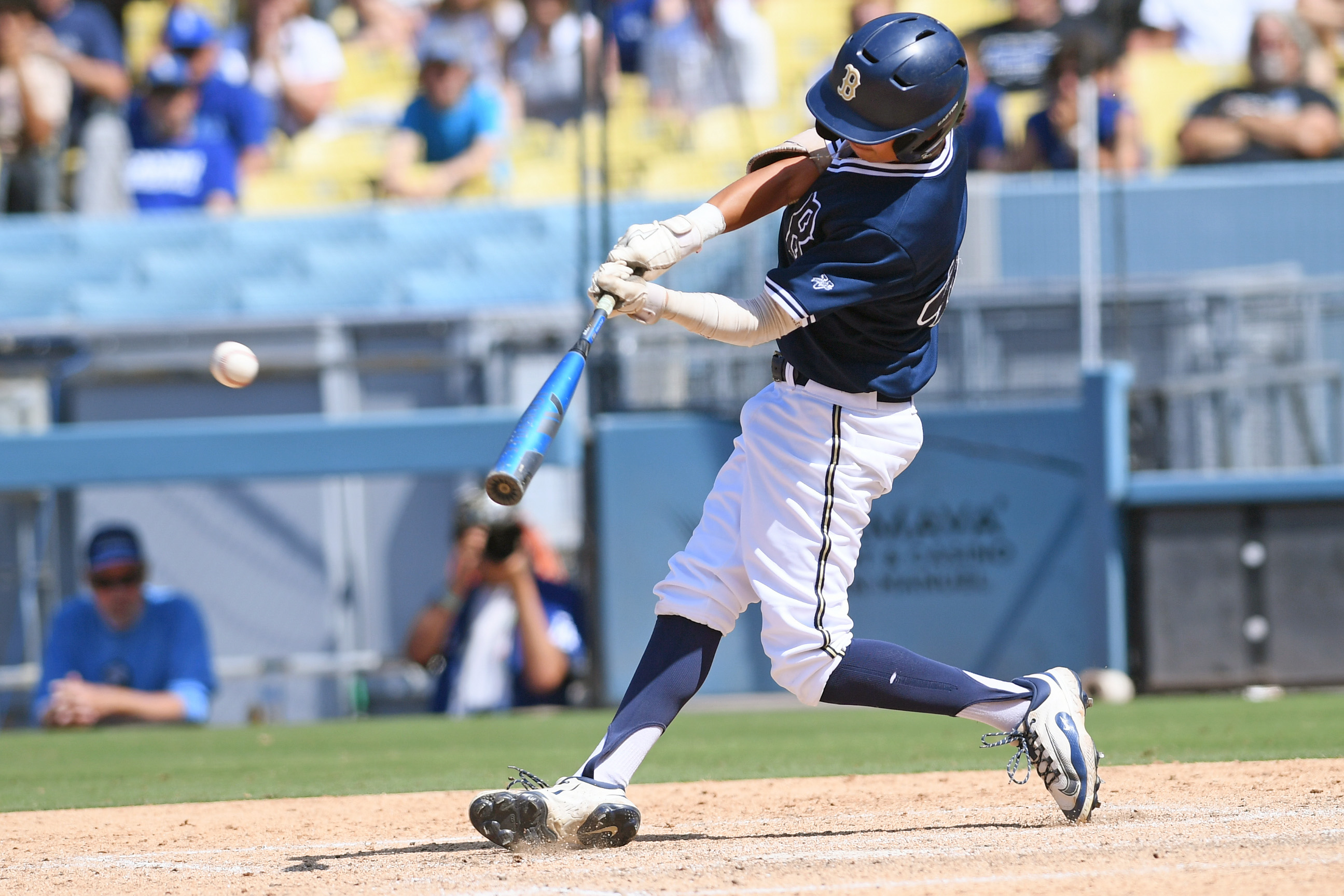 Masen Ruiz (41) of Birmingham hits a three-run triple against...
