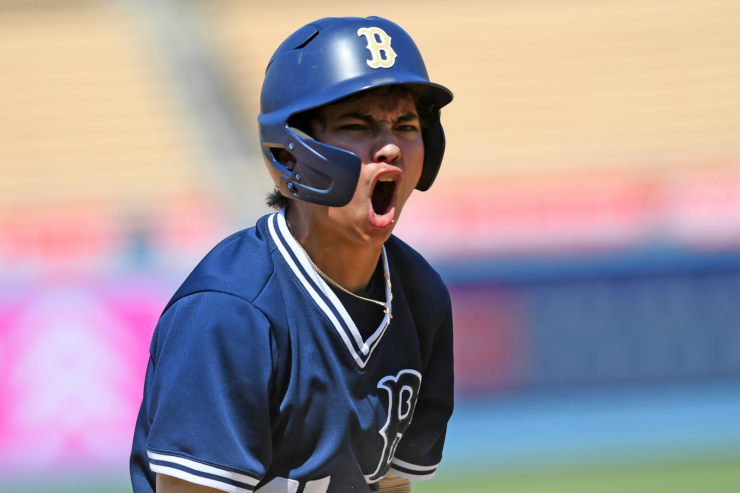 Masen Ruiz (41) of Birmingham reacts after hitting a three-run...