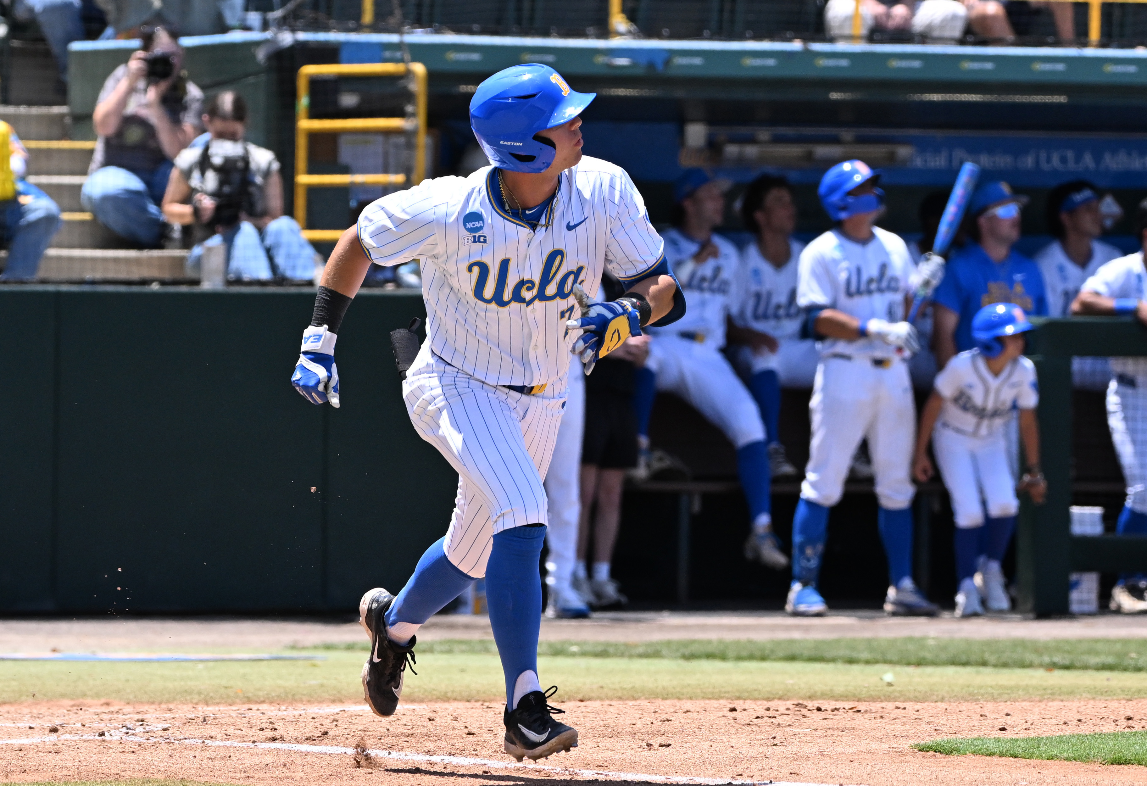 Roman Martin #7 of the UCLA Bruins watches his solo...