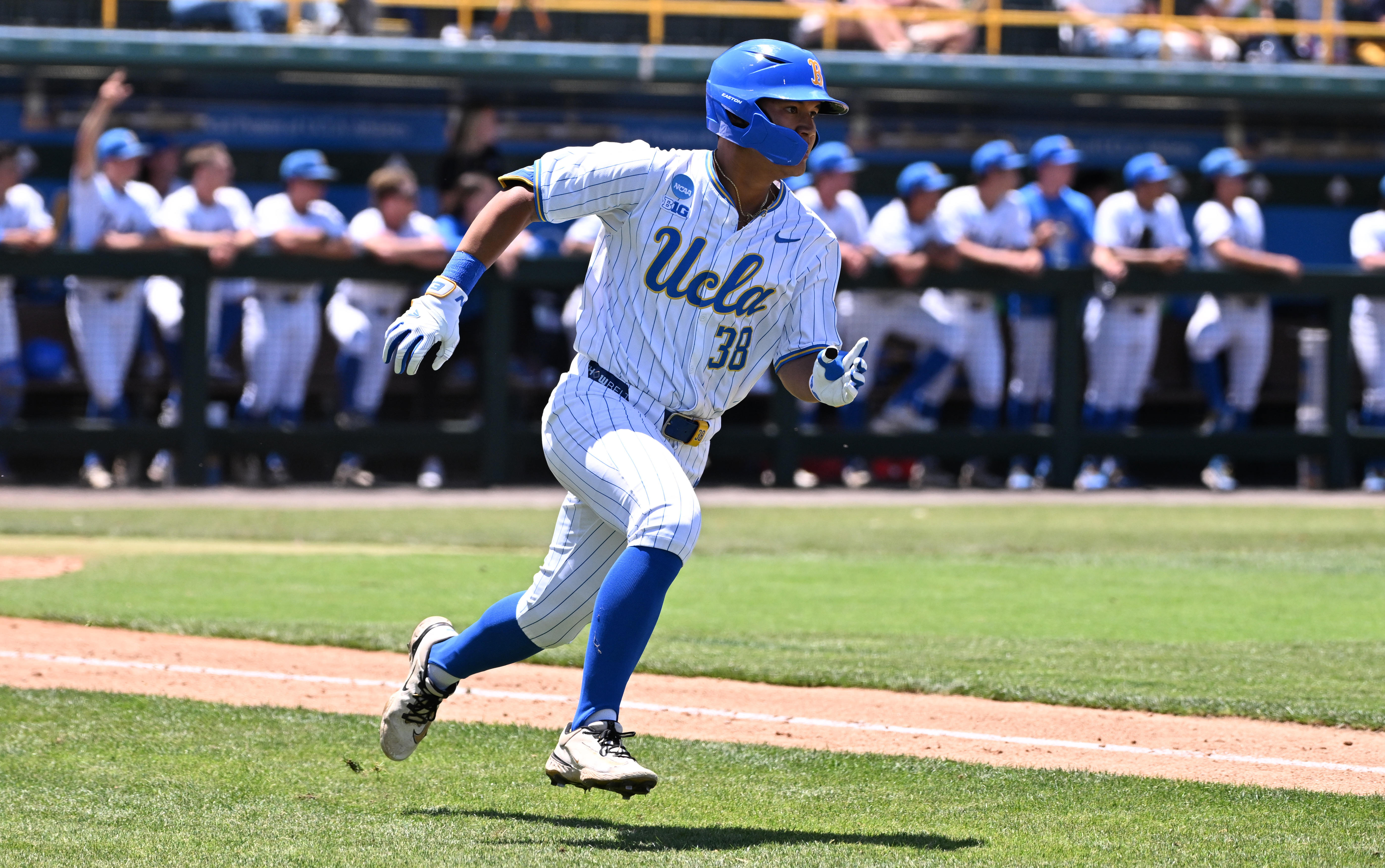 Trey Gudoy #38 of the UCLA Bruins doubles against the...