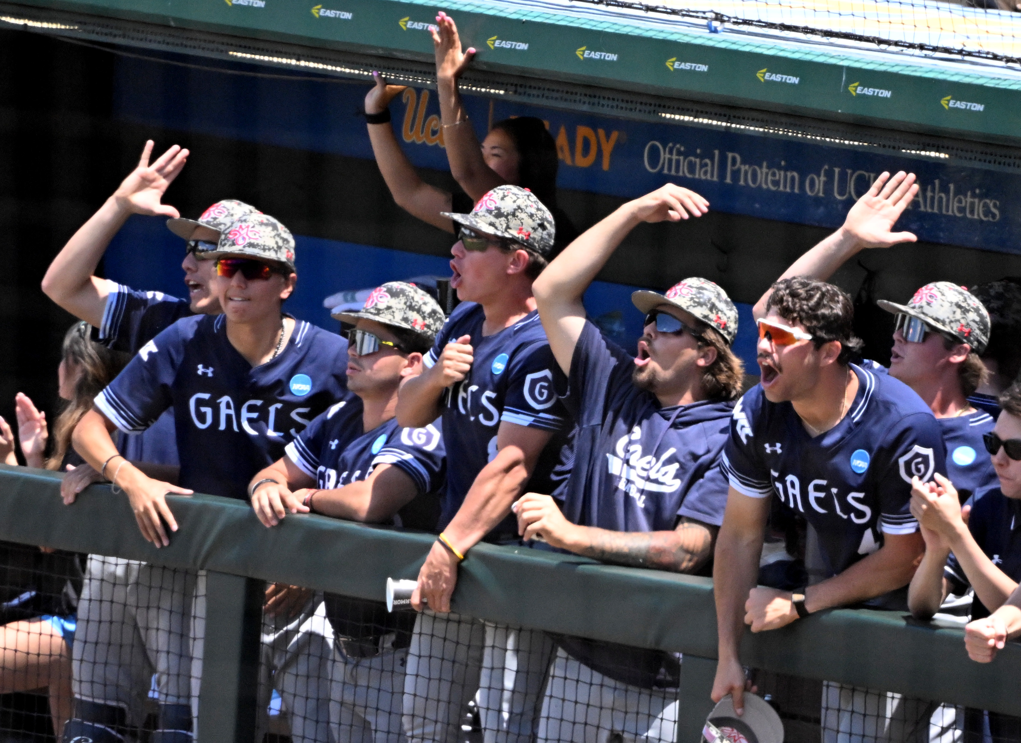 Saint Mary’s (CA) Gaels bench reacts as teammate Tanner Griffith...
