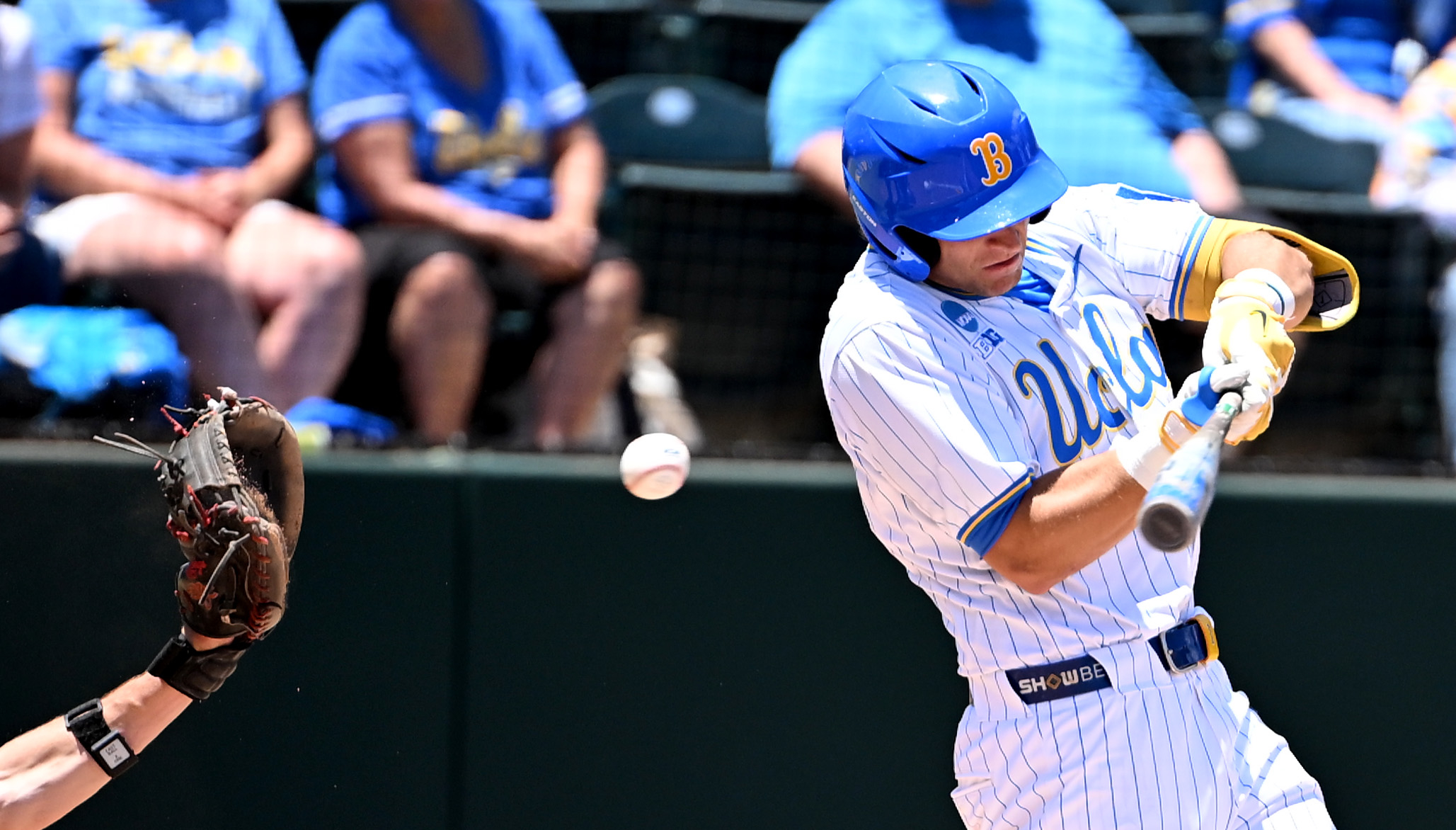 Roch Cholowsky #1 of the UCLA Bruins strikes out against...