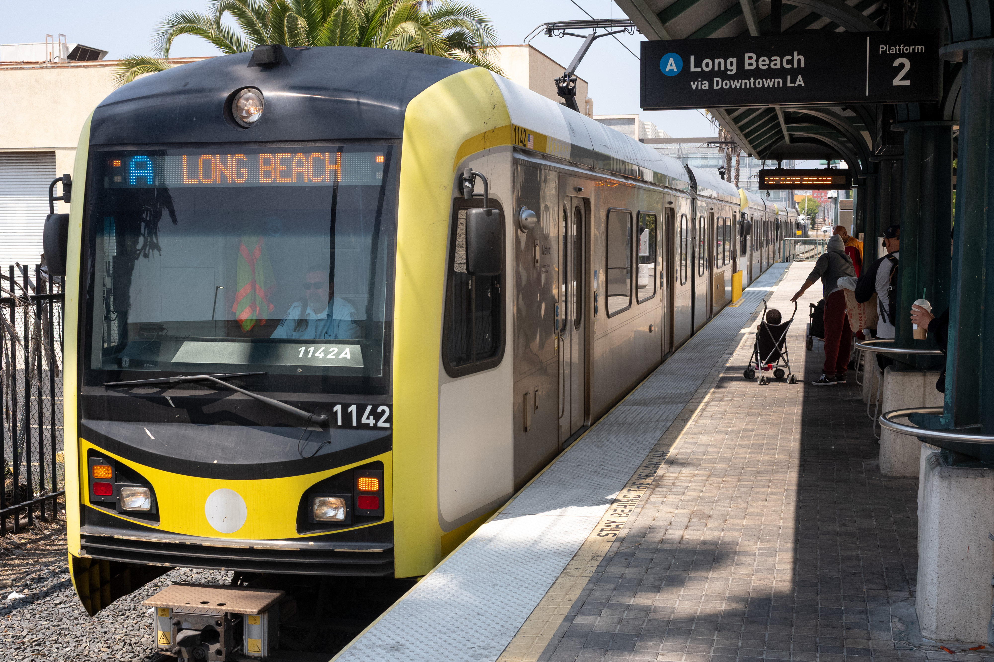 The A line train stops for riders at the Fillmore...