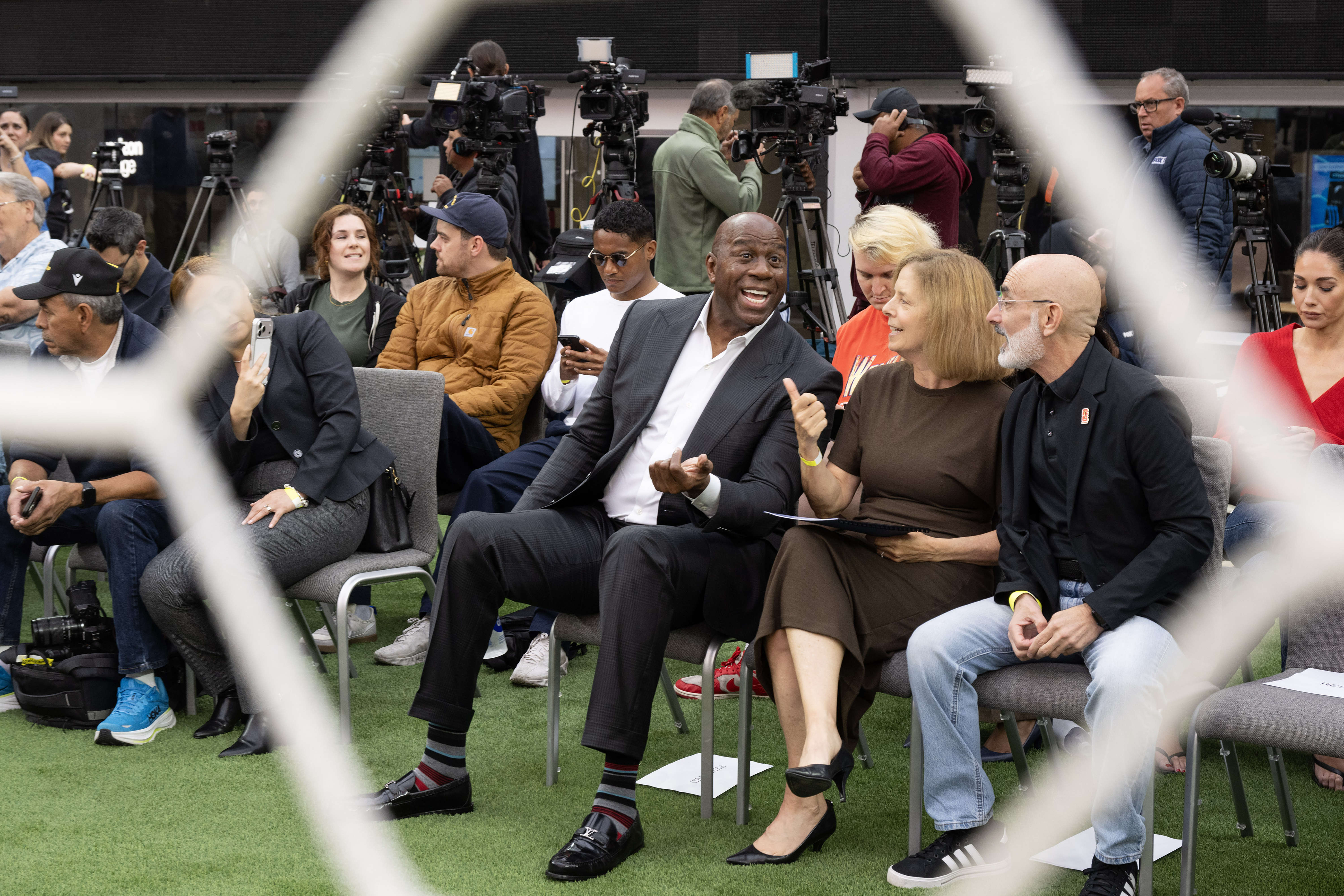 From left, Earvin âMagicâ Johnson, Kathryn Schloessman and Larry Freedman...