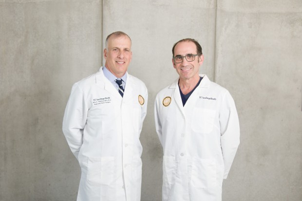 Sean Wolfe's acoustic neuroma team at UCSD Health was Dr. Rick Friedman (left), a neurologist who specializes in skull base surgery, and Dr. Marc Schwartz, a neurosurgeon specializing in skull base tumors. (UC San Diego Health)