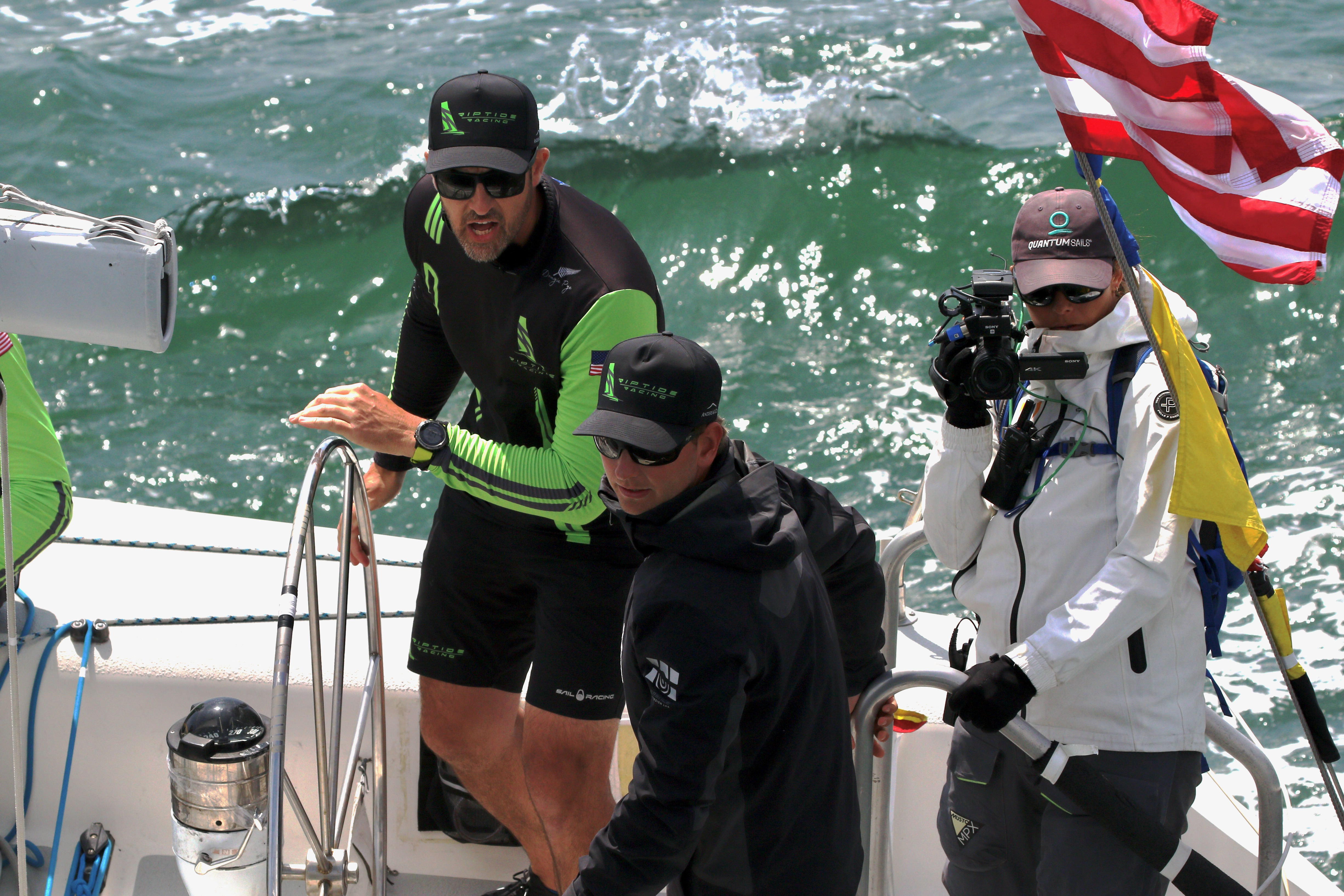 Chris Poole skippers his crew during the pre-start of the...