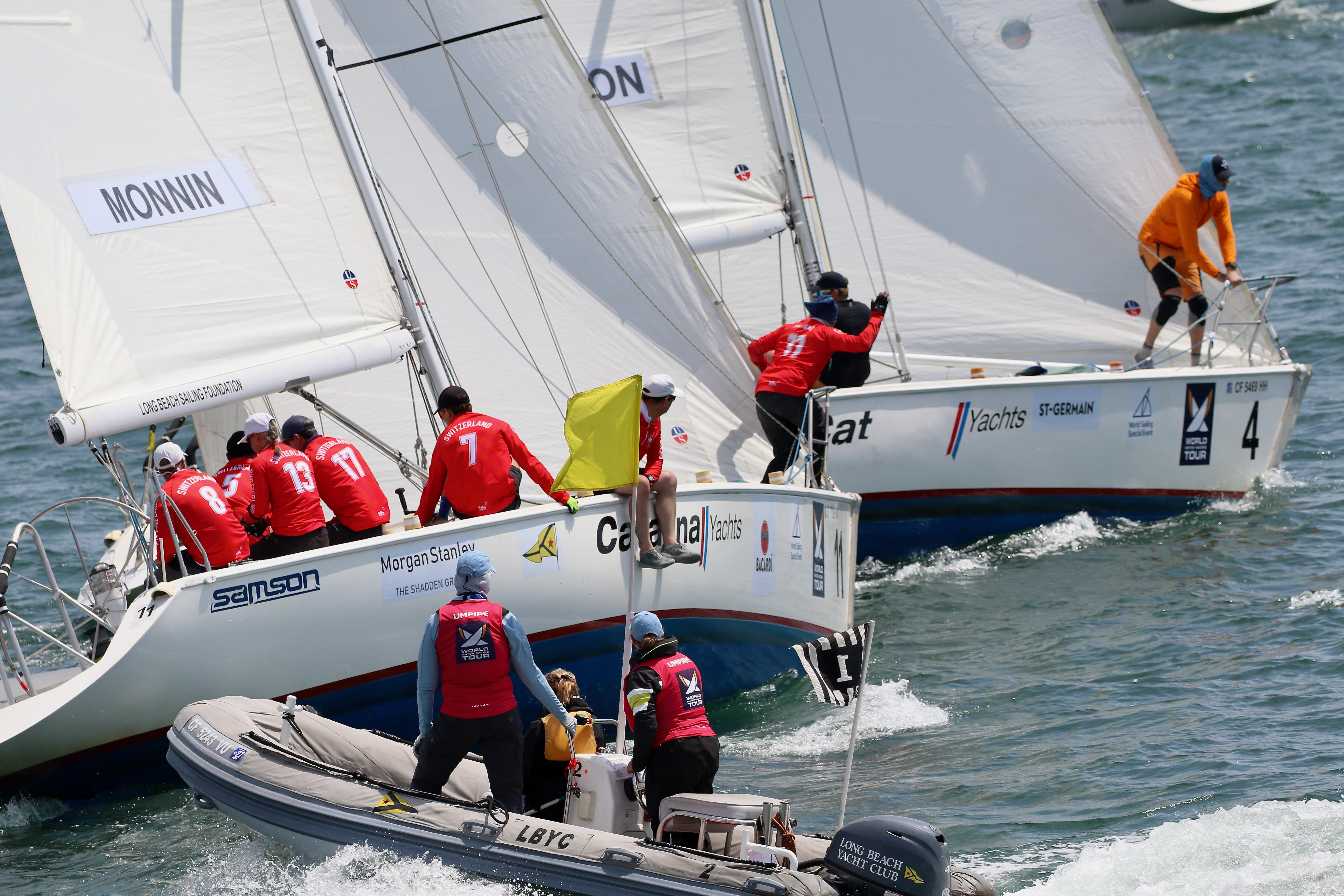 Umpires watch for contact as Eric Monninâs Swiss team closely...