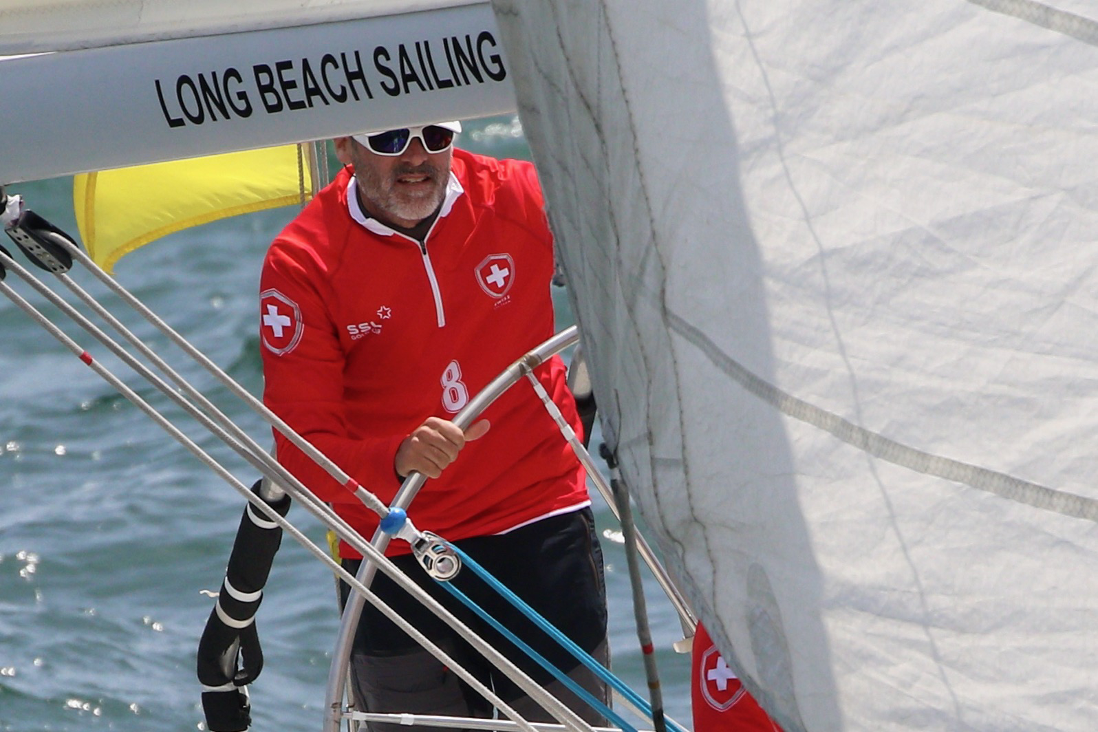 Defending champion Eric Monnin skippers his Swiss team during the...