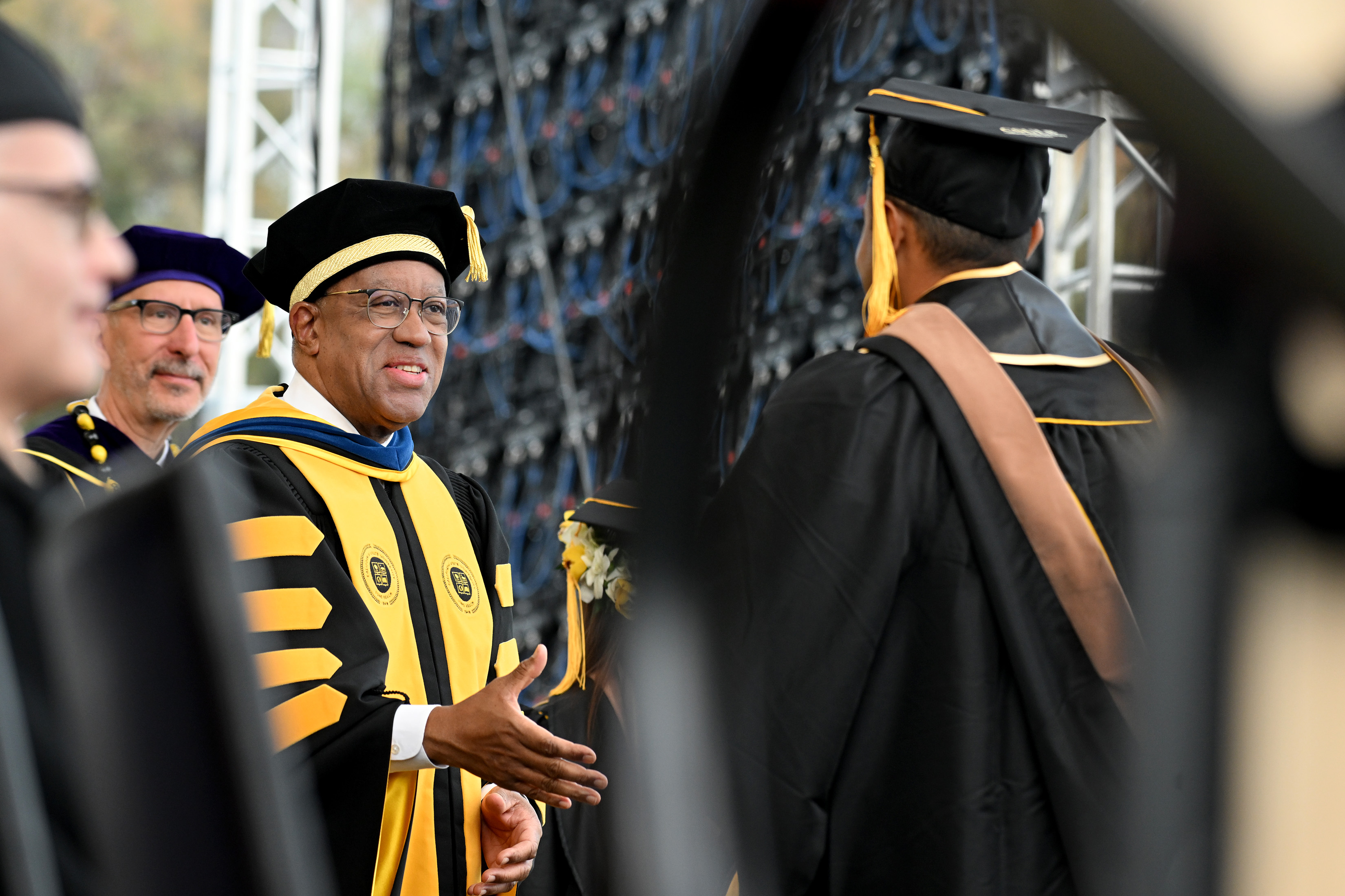 CSULB President Dr. Loren Blanchard congratulates Masters Degree graduates during...