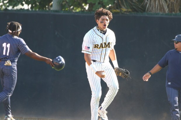 Millikan first baseman AJ Nonato jumps with emotion after his stellar catch in foul territory retired Summit in the sixth inning in Division 3 quarterfinal action on Friday, May 22, 2026, at Long Beach City College in Long Beach. (Photo by Howard Freshman, Contributing Photographer)