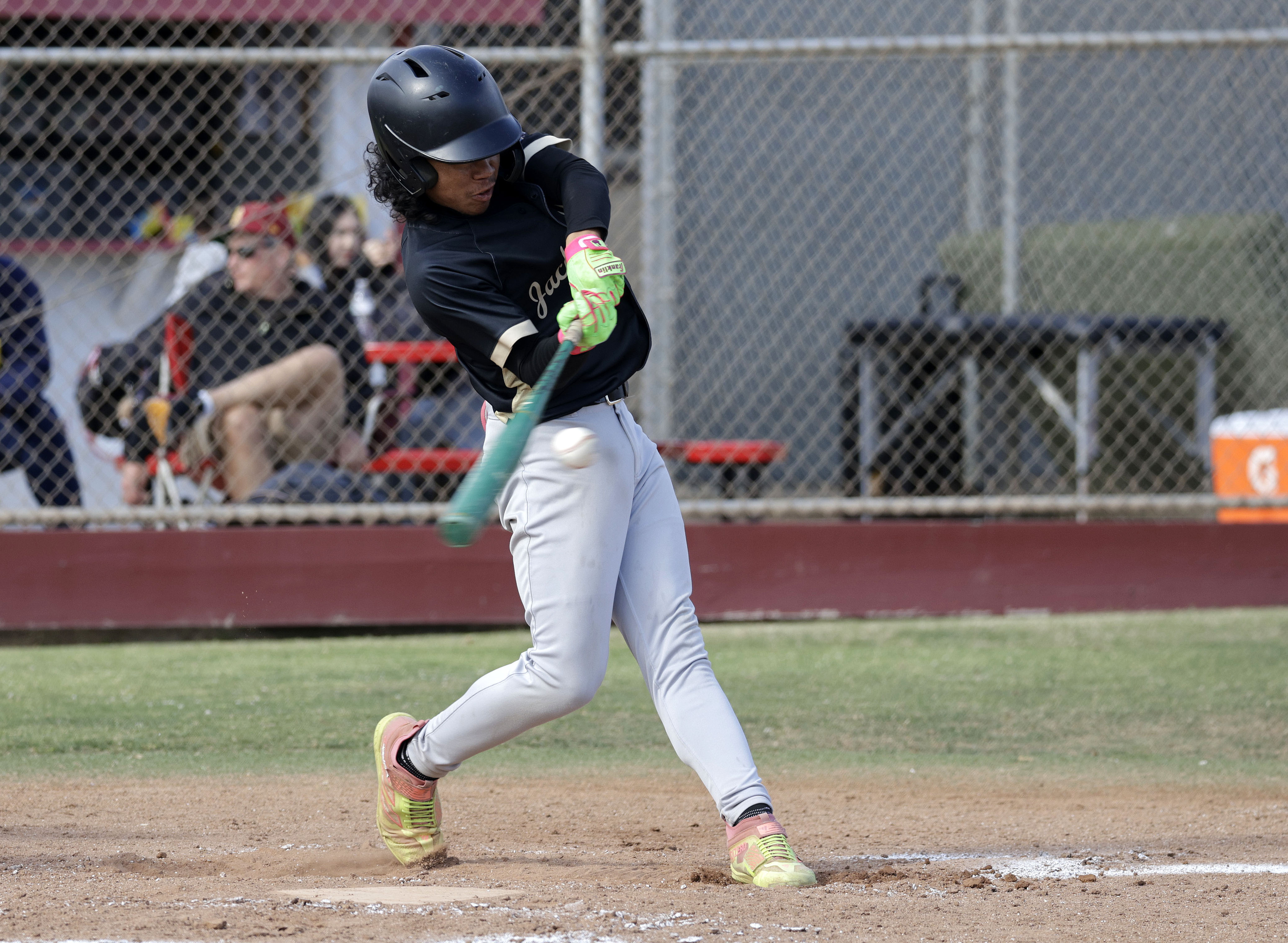 Long Beach Poly’s Malakai Pruitt (2) bats for the Jackrabbits...