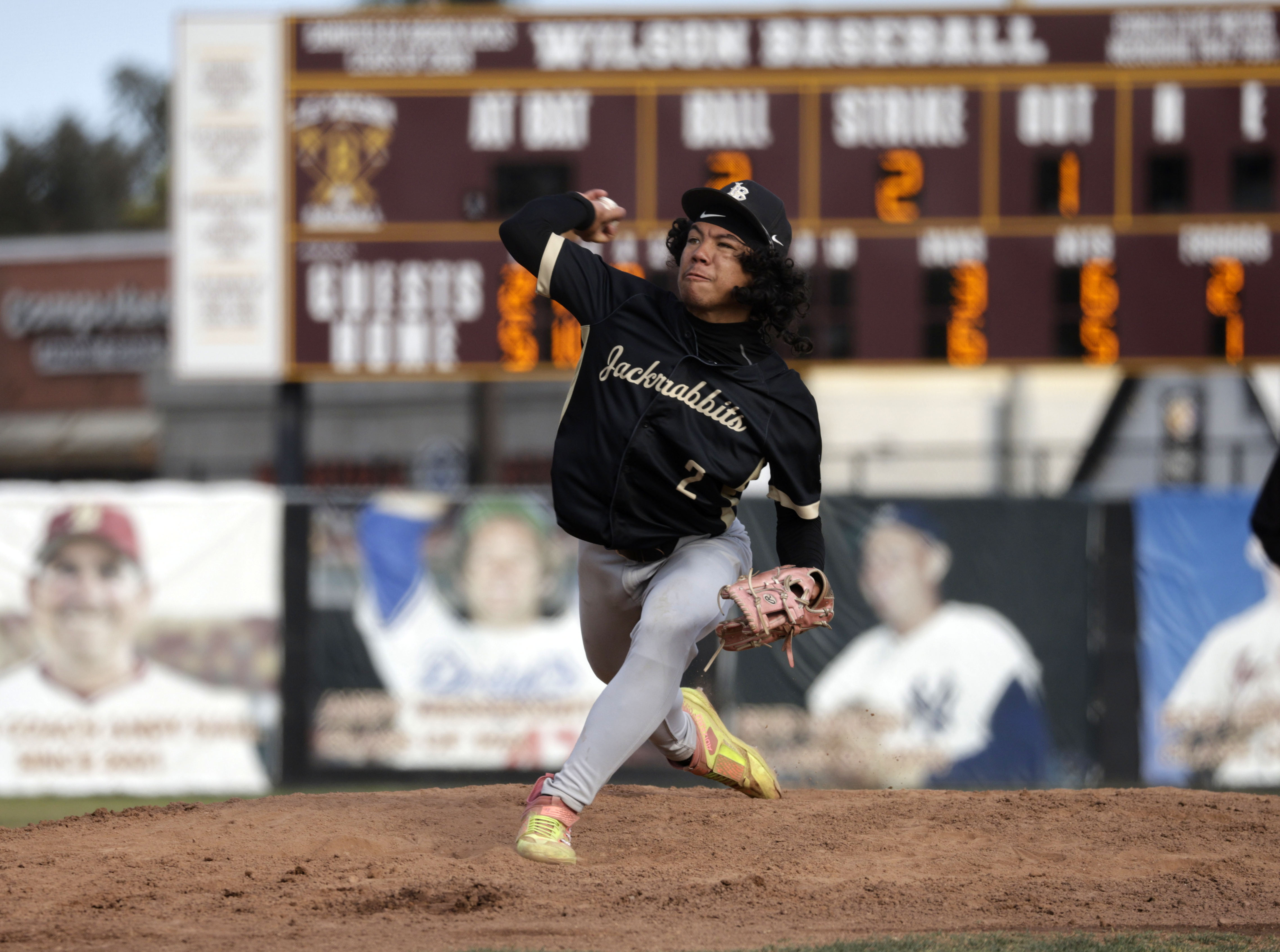 Long Beach Poly’s Malakai Pruitt (2) gets things started for...