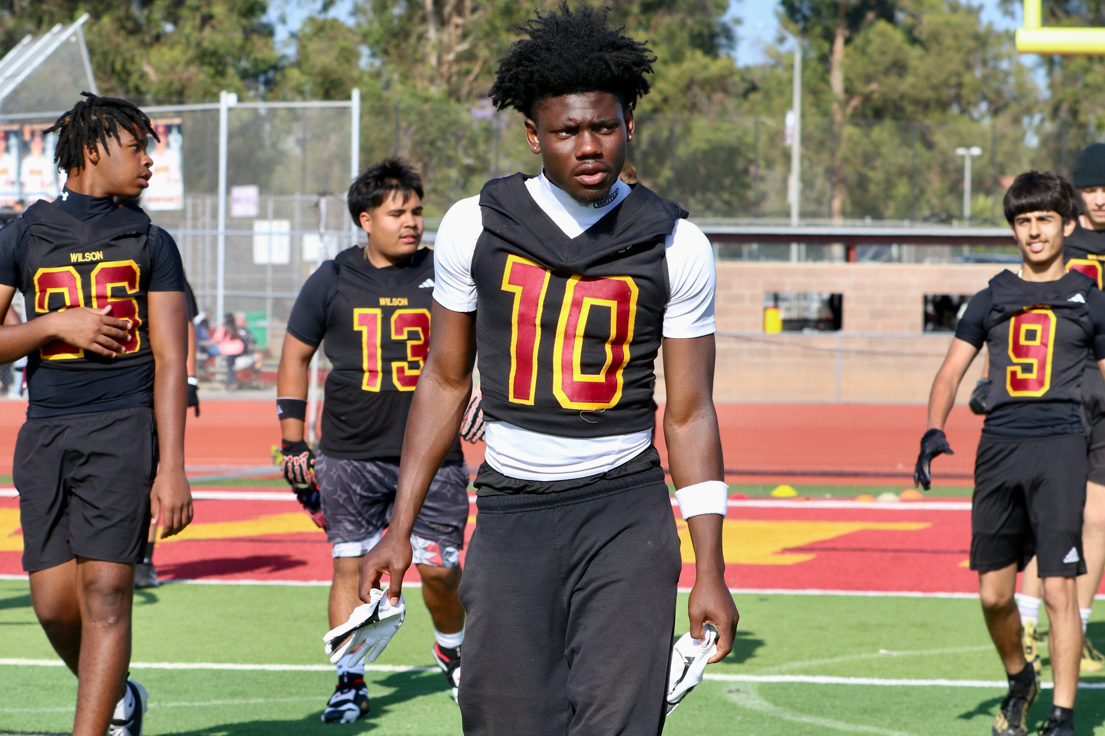 Wilson running back / defensive back Jemel Grigsby takes part...