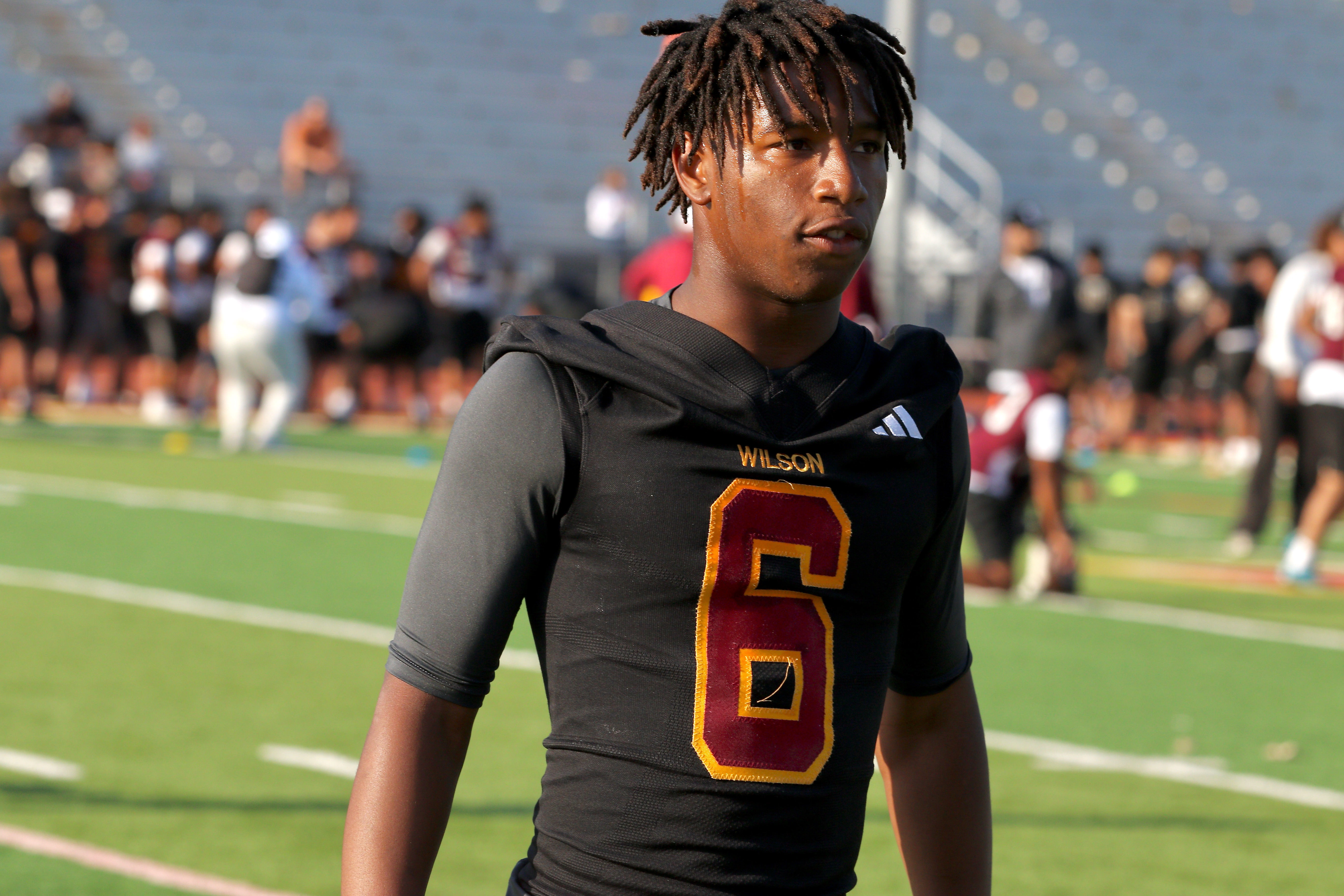 Wilson receiver and defensive back Kyle Harris takes part in...