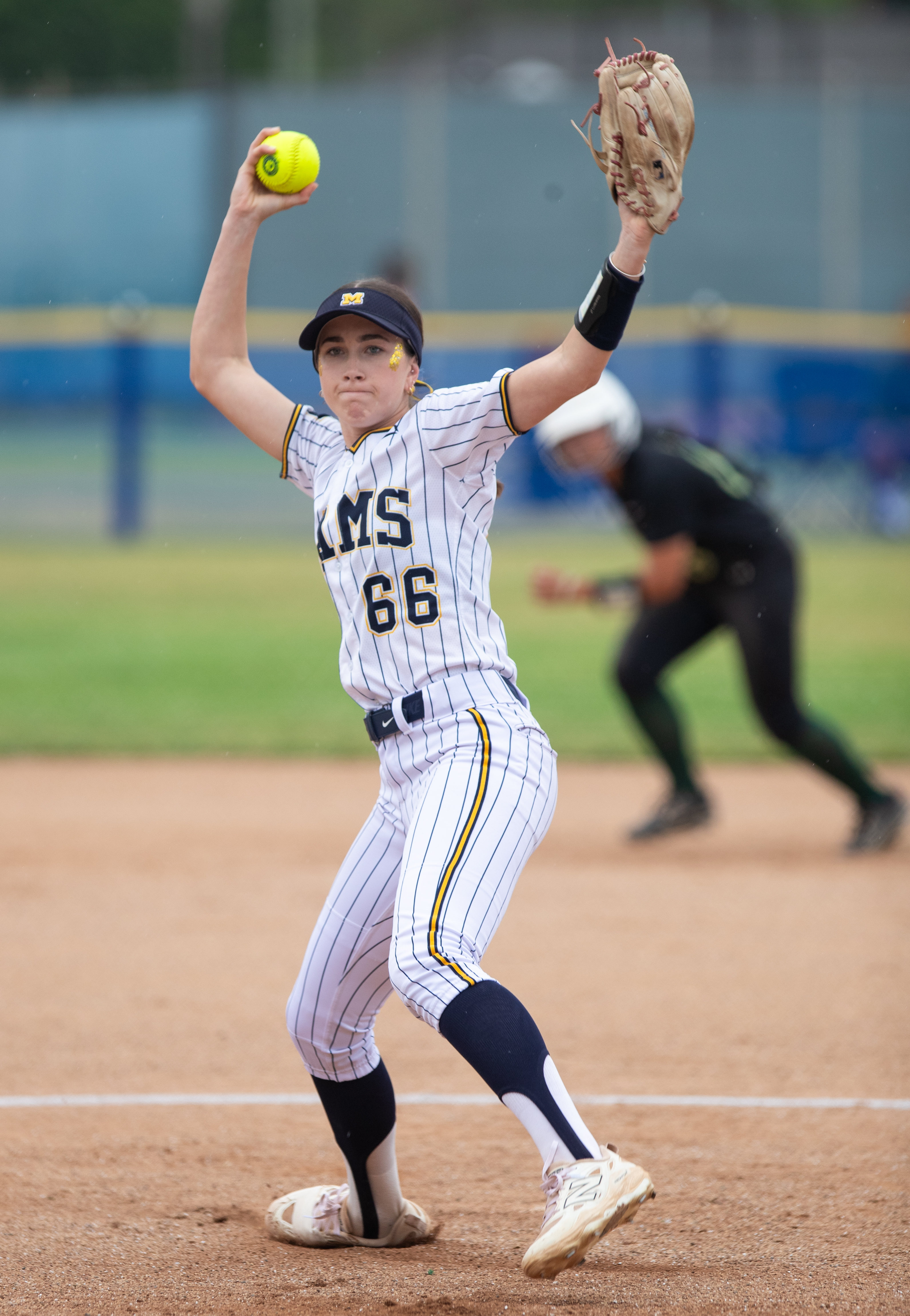 Millikanâs Riley McAndrew pitches against Long Beach Poly during a...