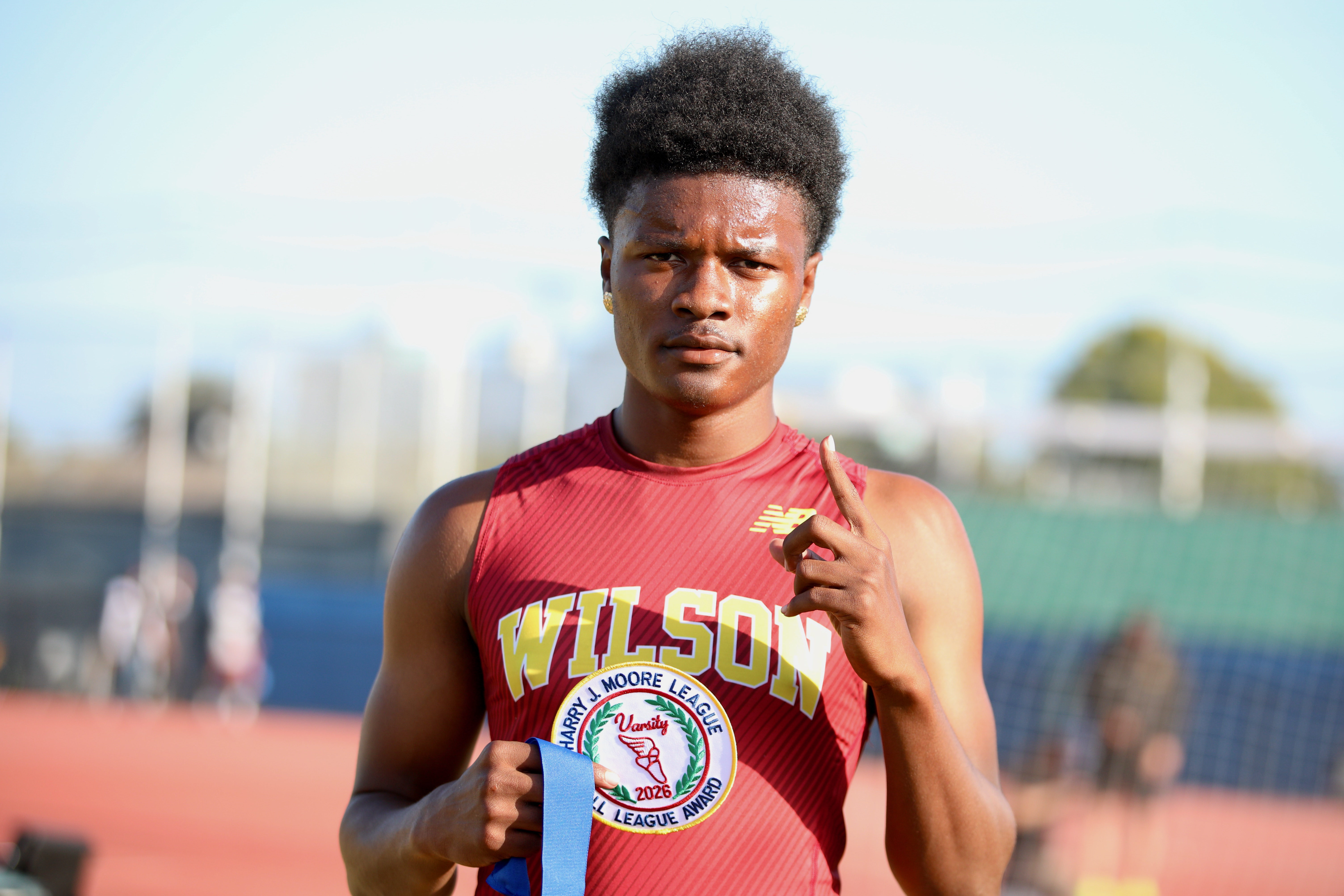 Wilsonâs Kaedyn Burroughs finished first in the boy’s 400-meter dash...