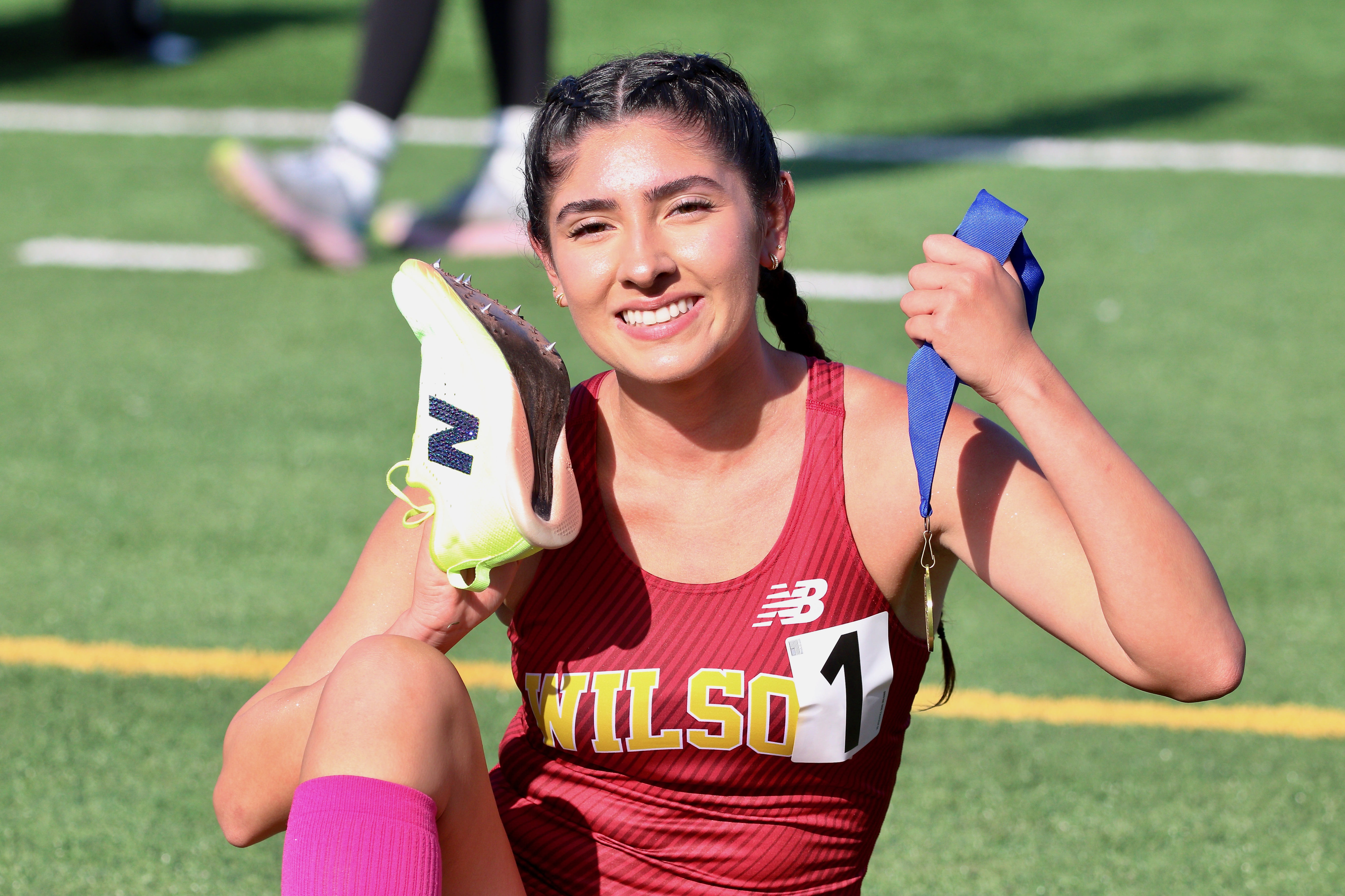 Wilsonâs Nadia Mejia finished first in the girlâs 1600-meter dash...