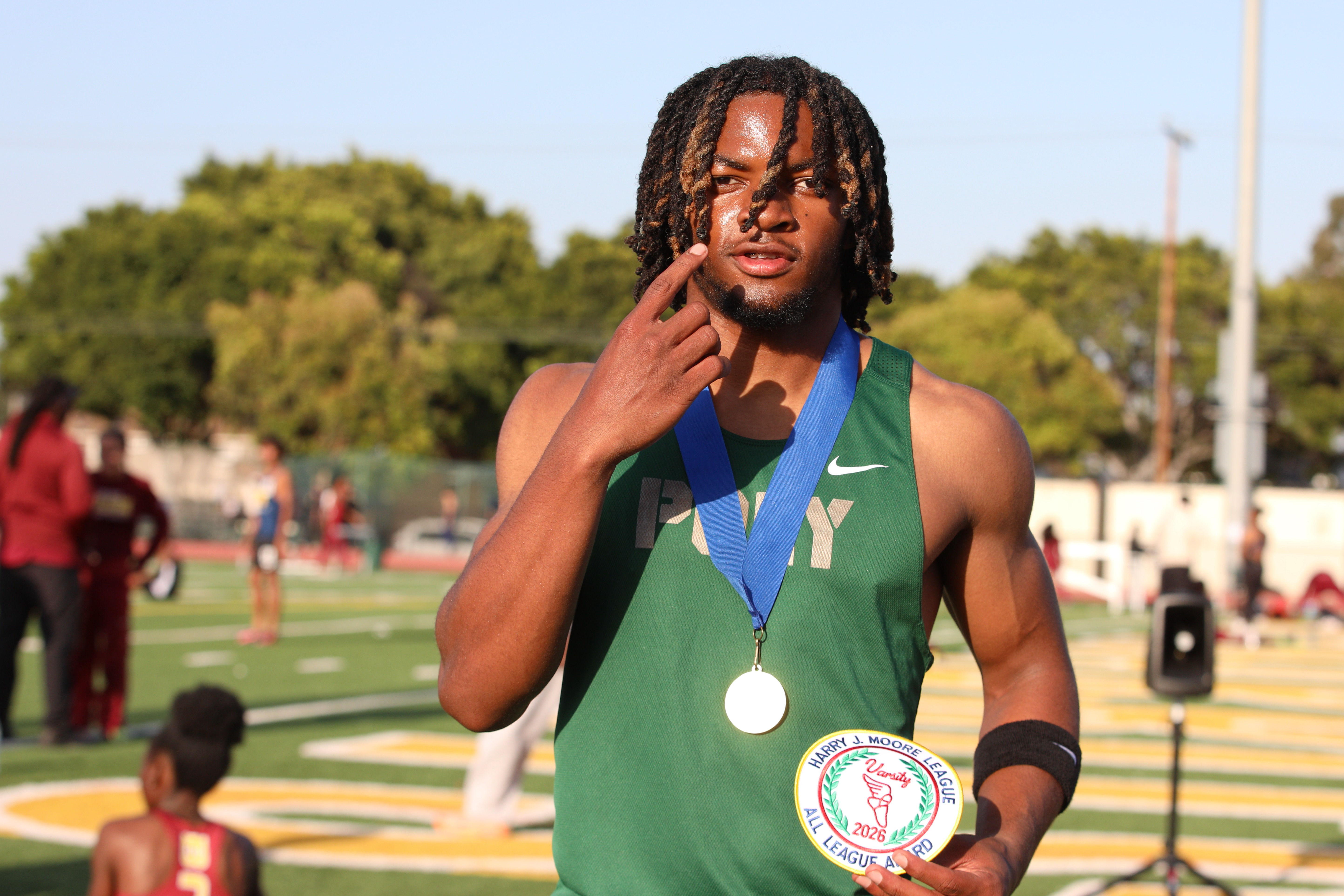 Polyâs Malachi Dawson finished first in the boyâs 100-meter dash...
