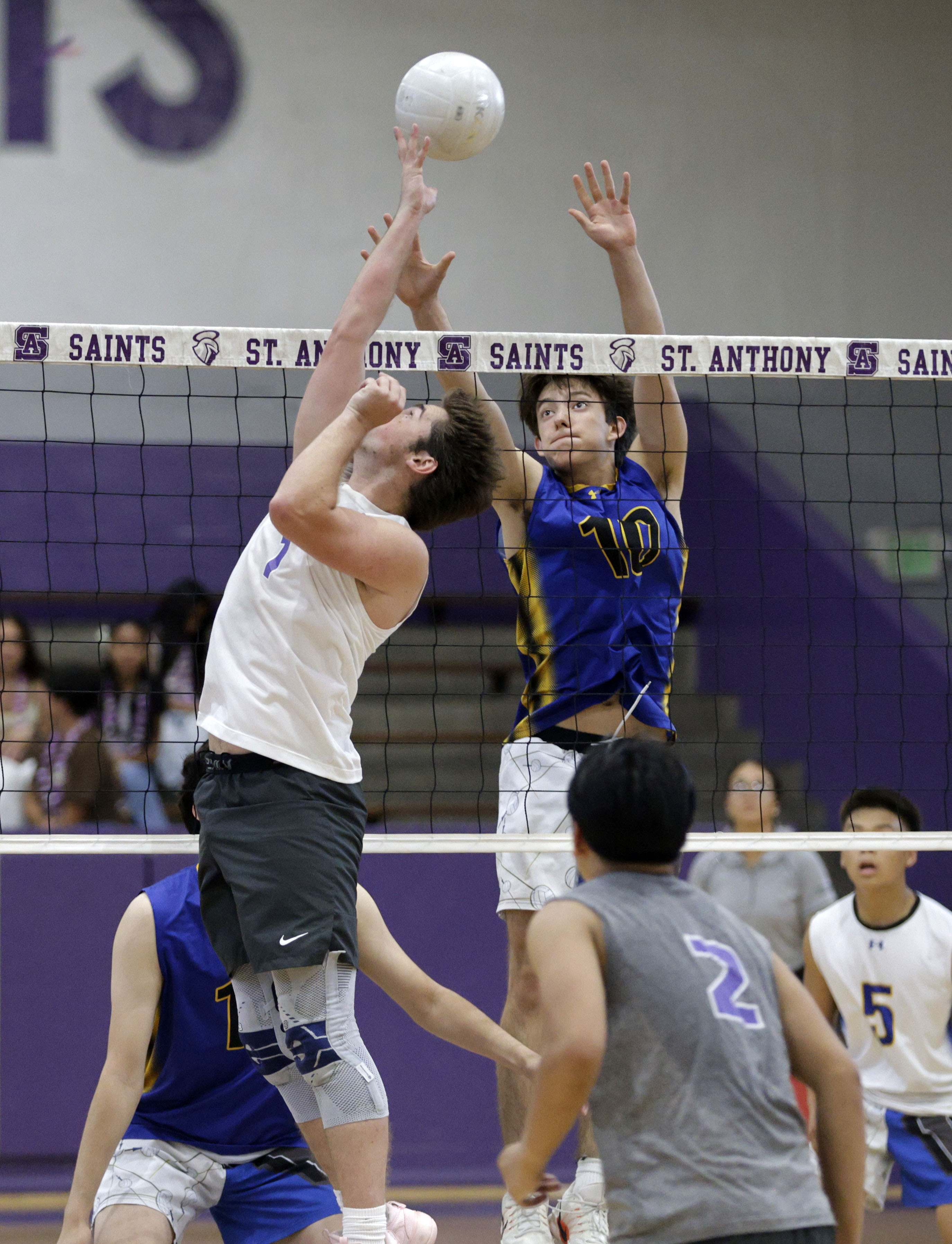 St. Anthony’s Noah Furlow (1) tries to tap the ball...
