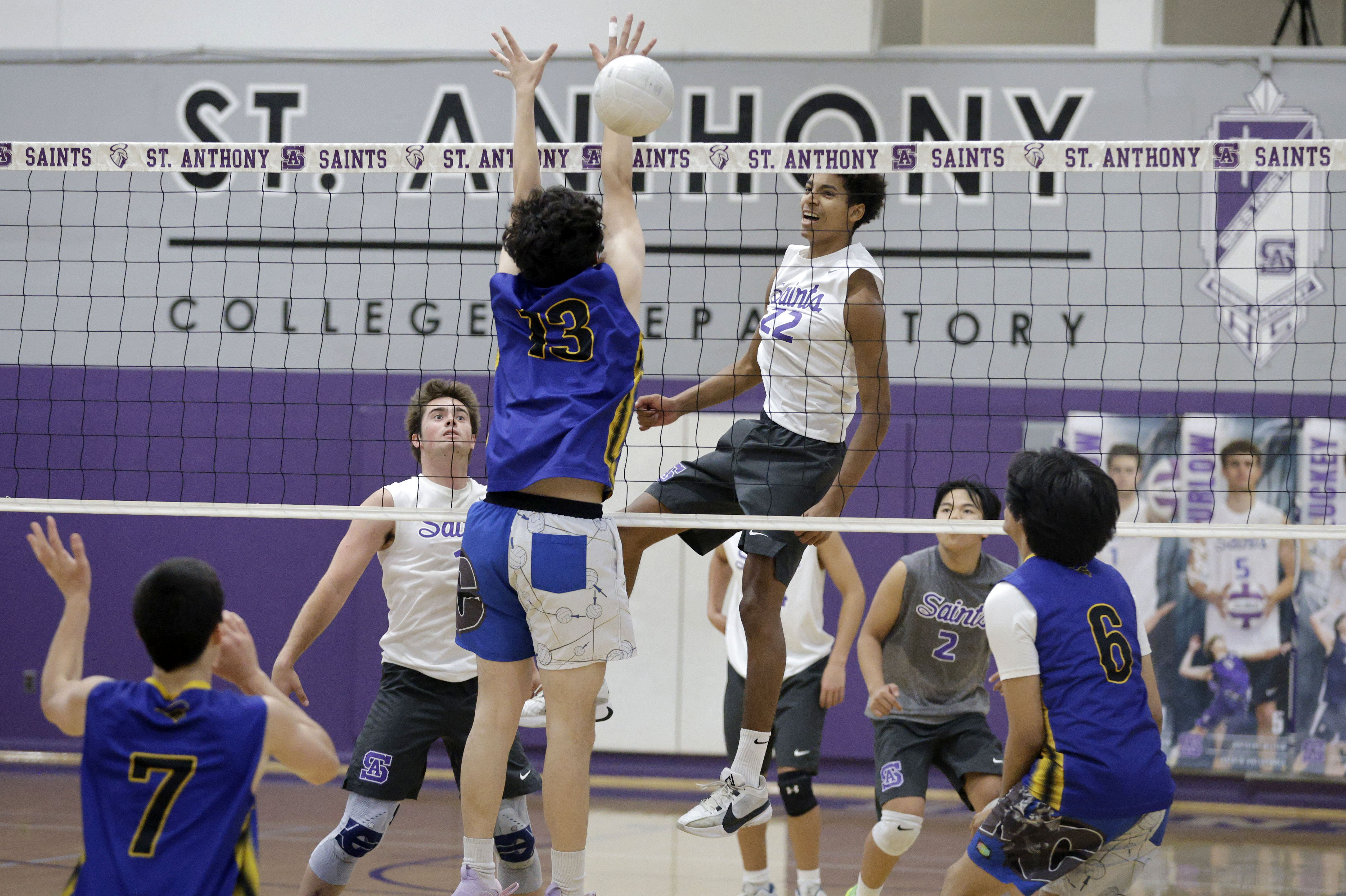 St. Anthony’s Eli Bell (22) hits one past Western Christians...