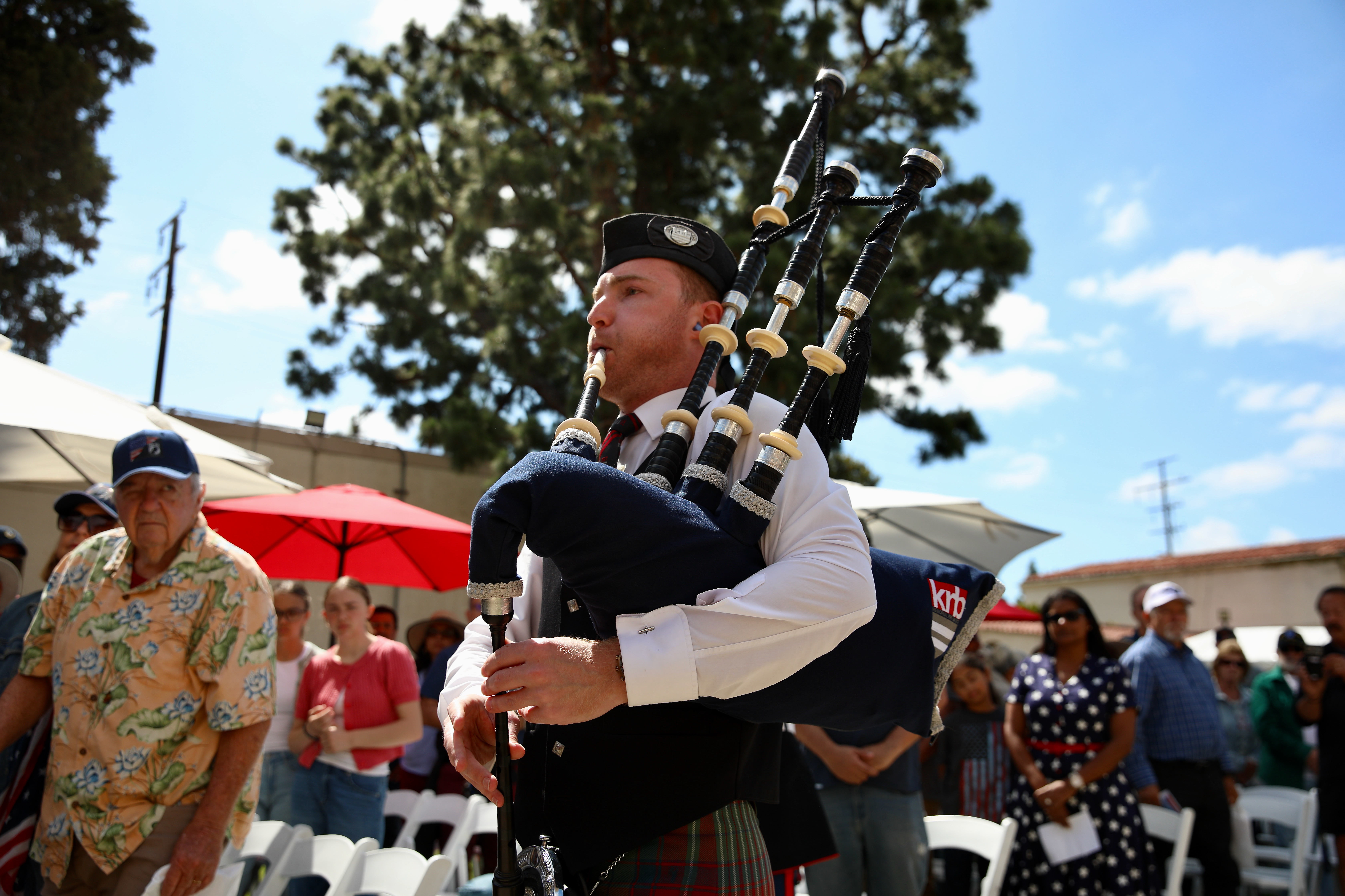 Pipe Major Alex Walker marches at a Memorial Day ceremony...