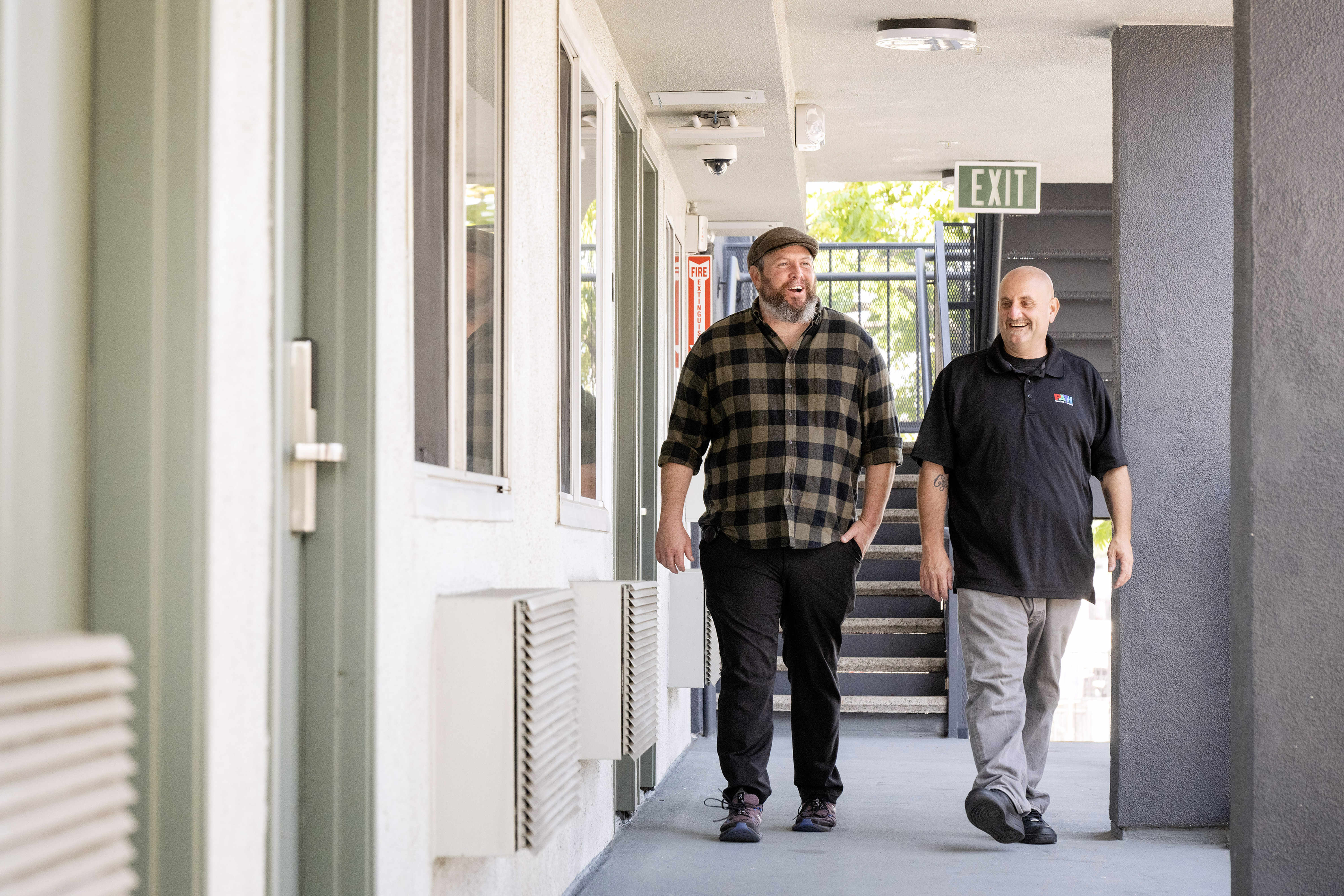 From left, Long Beach Homeless Services Bureau Manager Paul Duncan...