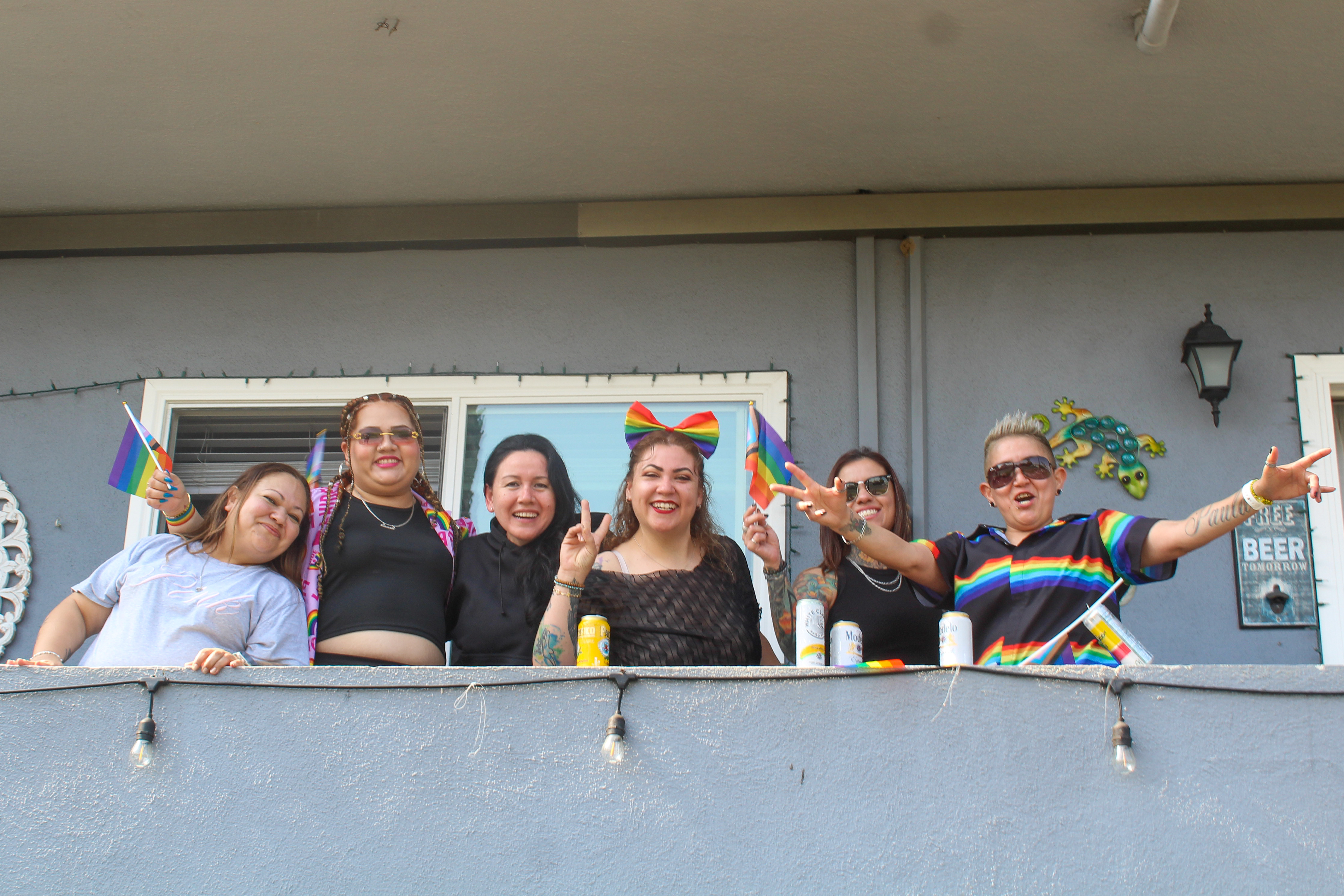People celebrated from their balconies during the 43rd annual Long...