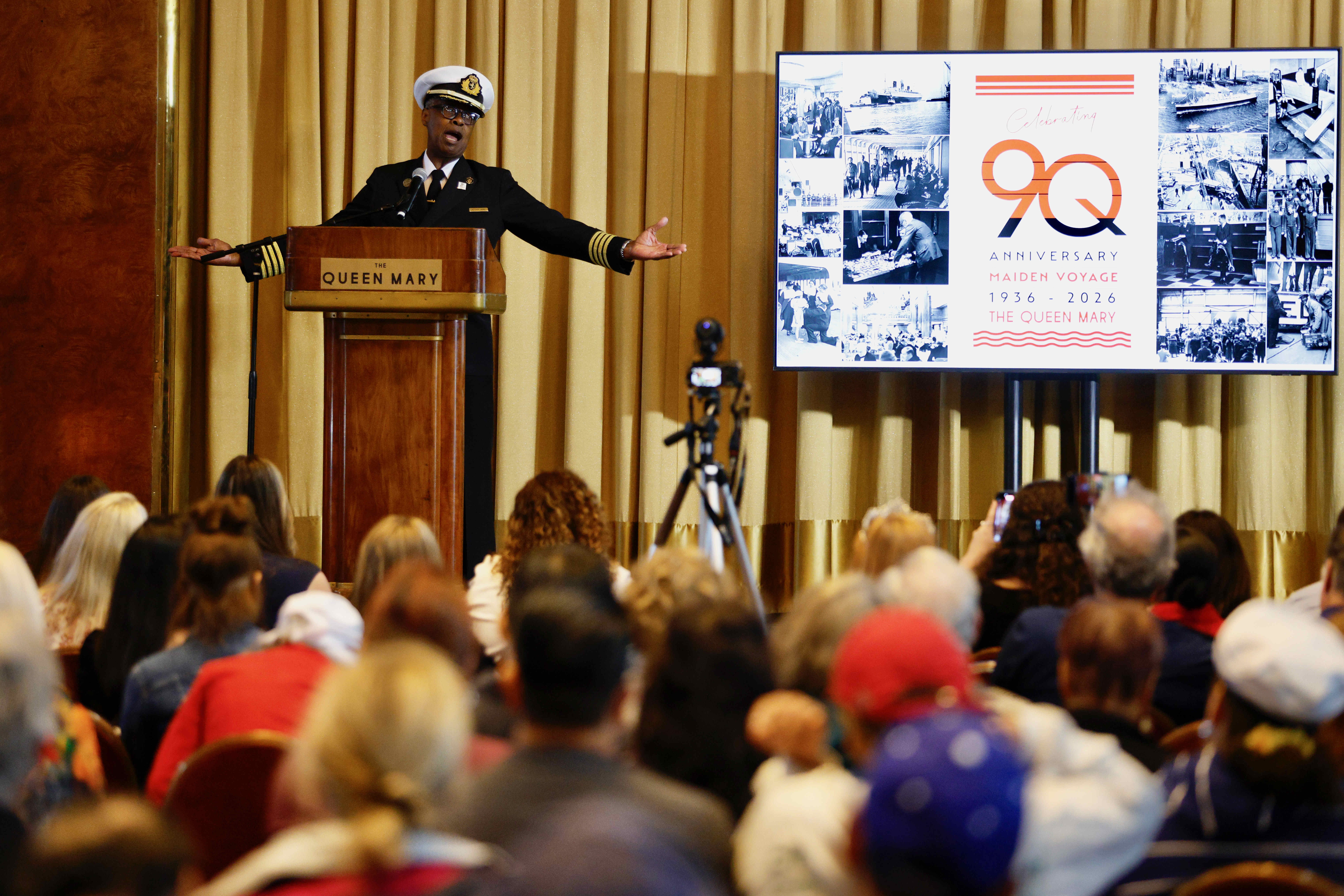 Queen Mary Capt. James Sanders addresses guests on Wednesday, May...