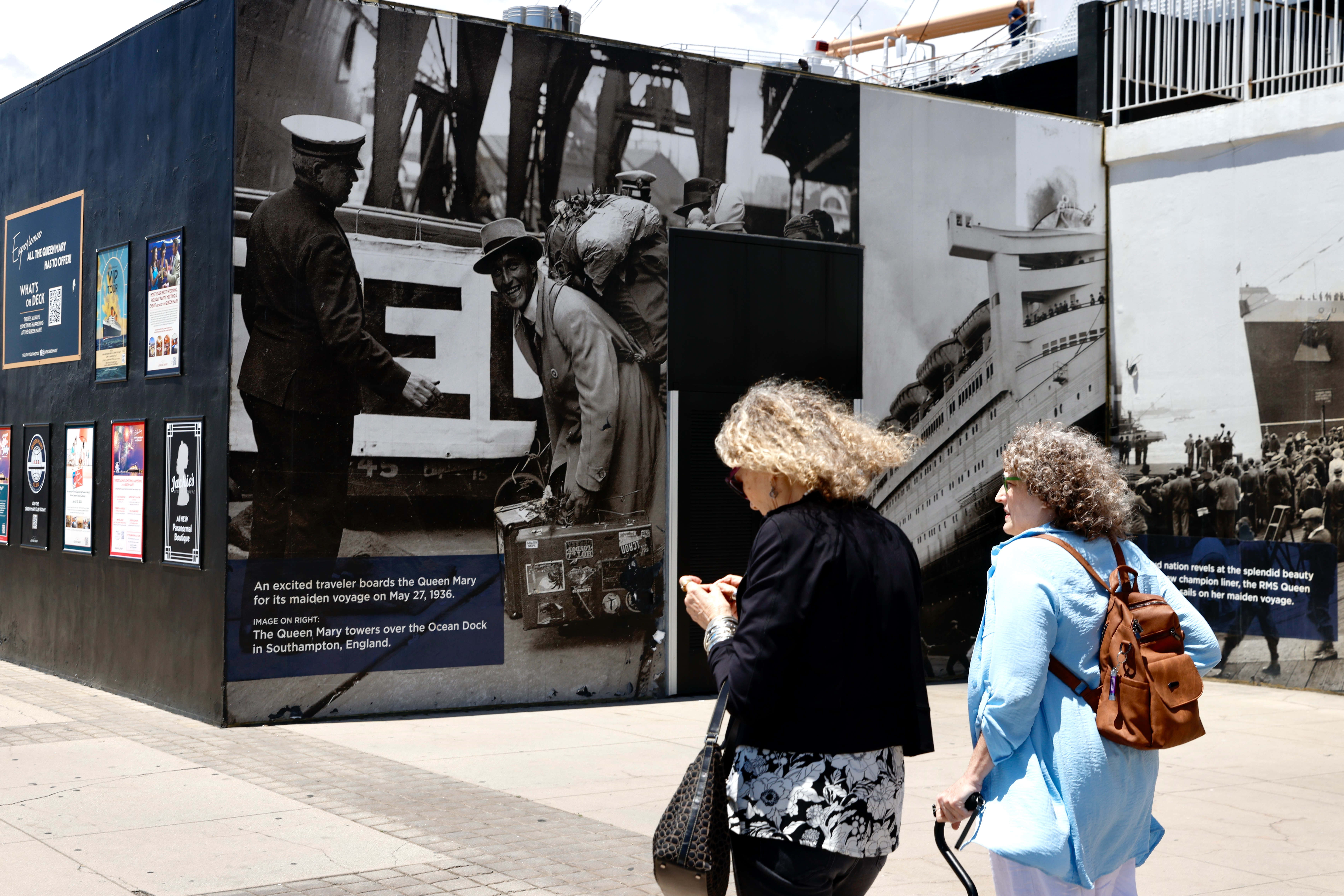 People visit the Queen Mary in Long Beach on Wednesday,...