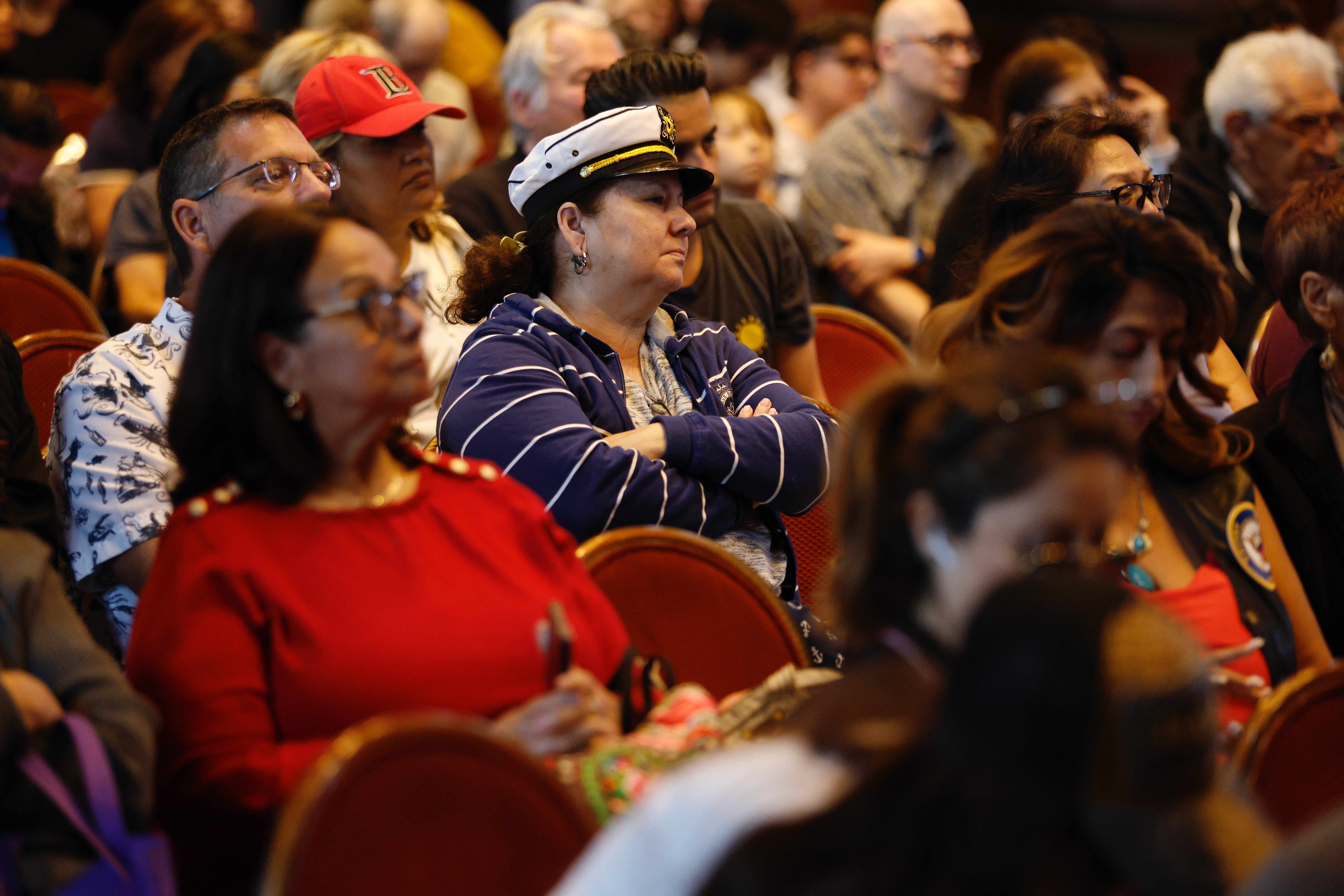 Visitors attend a ceremony aboard the Queen Mary in Long...