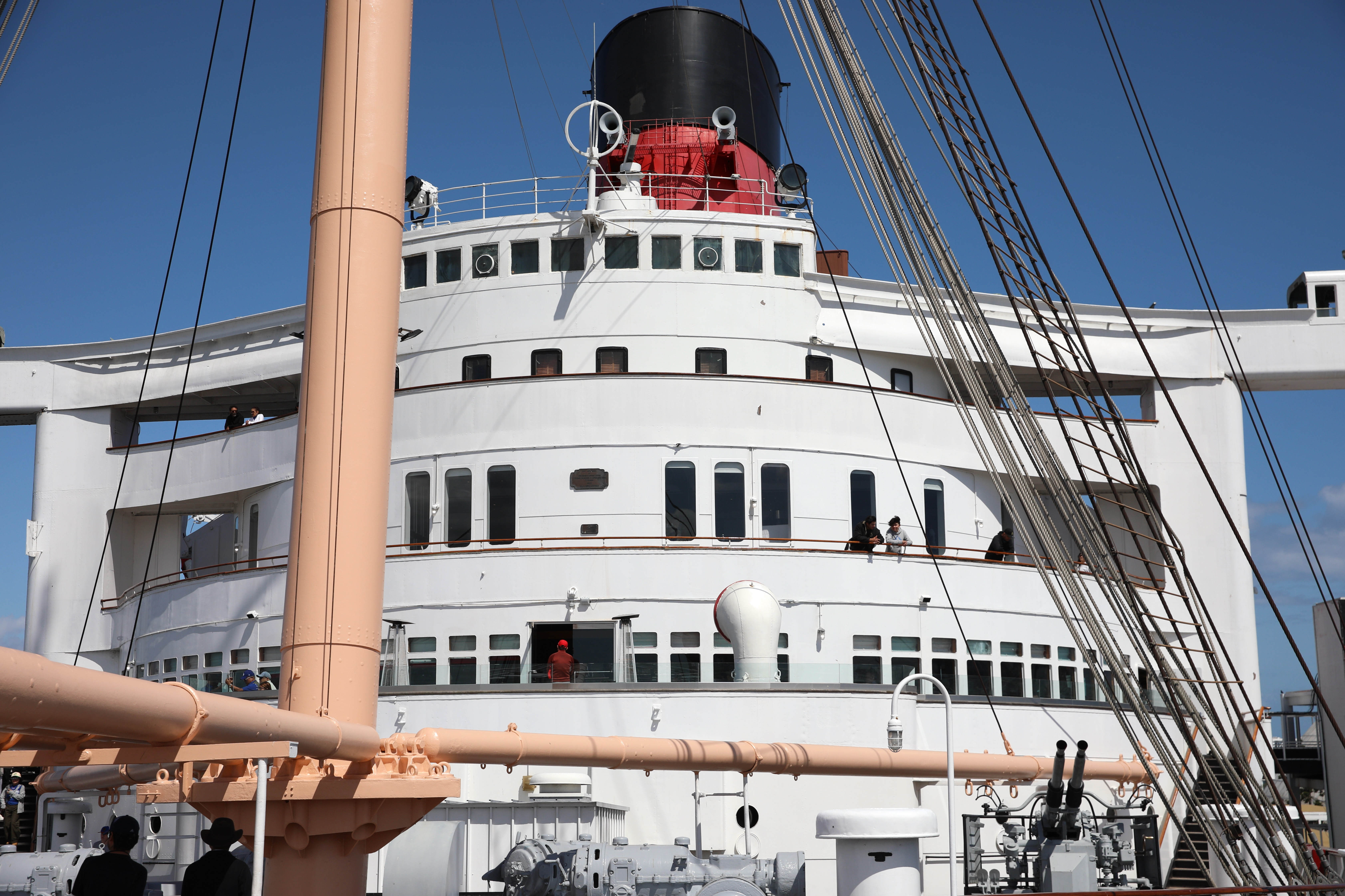 People visit the Queen Mary in Long Beach on Wednesday,...