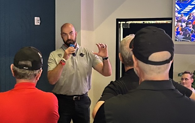 Coach Sean Lewis speaks to fans during SDSU Coaches Caravan event. (Kirk Kenney / San Diego Union-Tribune)