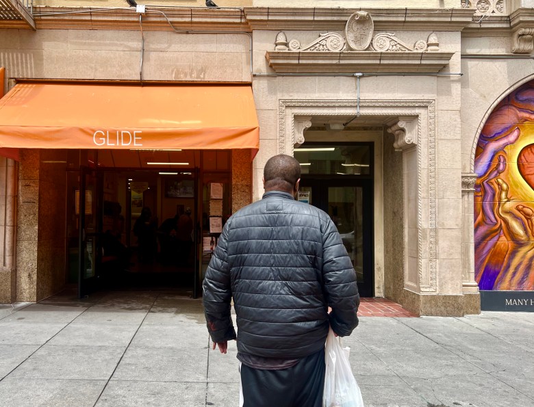 A man prepares to walk into Glide