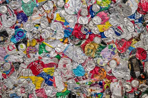 A closeup of a aluminum cans compressed into a block on display during a grand reopening of Republic Services' Anaheim Recycling Facility in Anaheim on Thursday, April 17, 2025. The Anaheim Recycling Facility went through a full rebuild and retrofit after a fire closed the site for three years. (Photo by Leonard Ortiz, Orange County Register/SCNG)